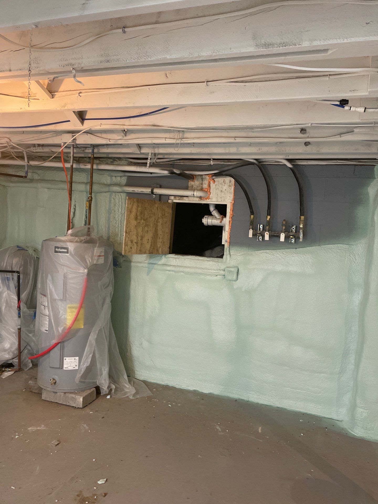Basement Exterior Walls using Closed Cell Spray Foam by NYS Foam & Energy