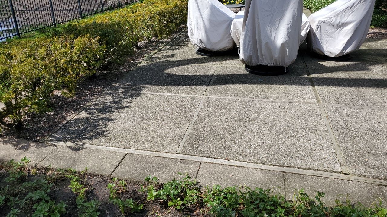 Aggregate concrete cleaning and sealing using Surebond SB-9000 by Northern Power Washing LLC.