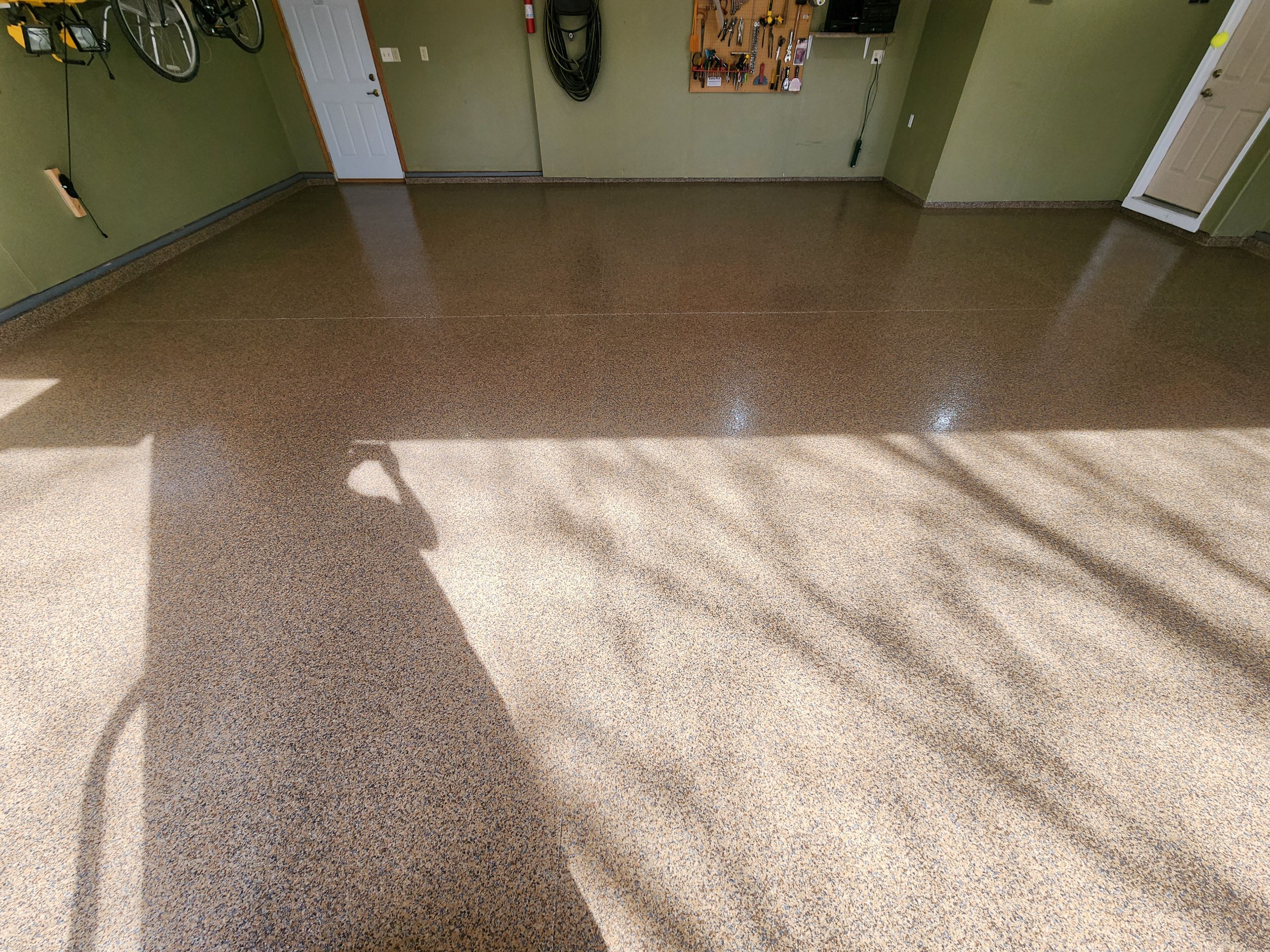 Sioux Falls Garage Floor Concrete Coating with Textured Aggregate by Select Painting, Coatings & Garage Cabinets
