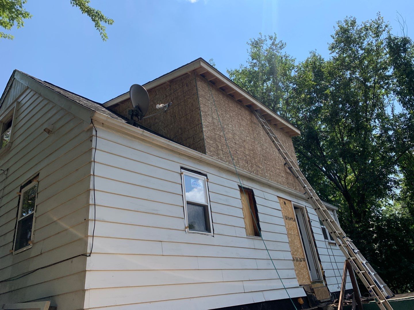 Room addition on the second floor of house by Greenspring Construction Services