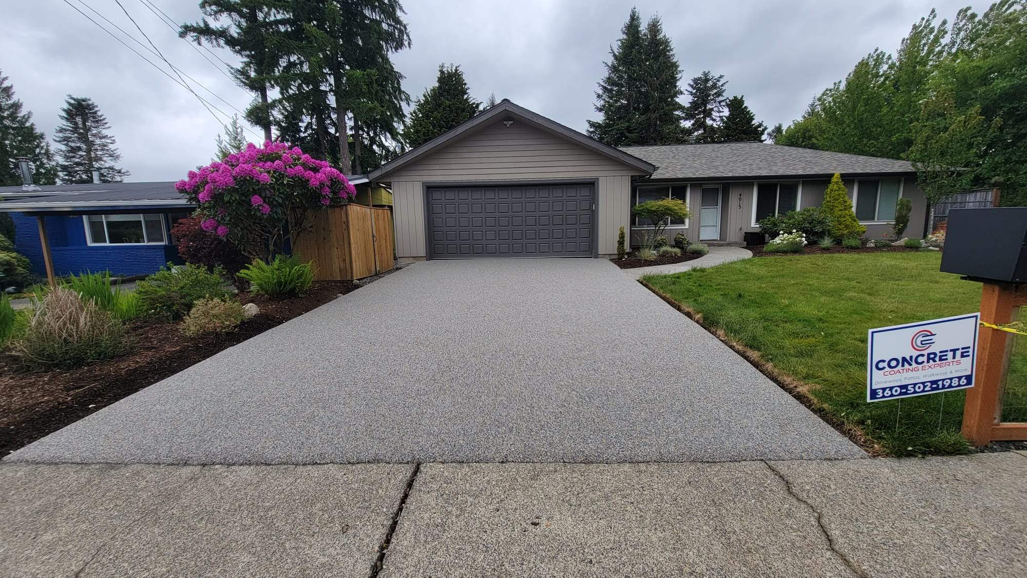 Classic Simplicity Driveway in Monticello Vuba Stone by Concrete Coating Experts Inc.