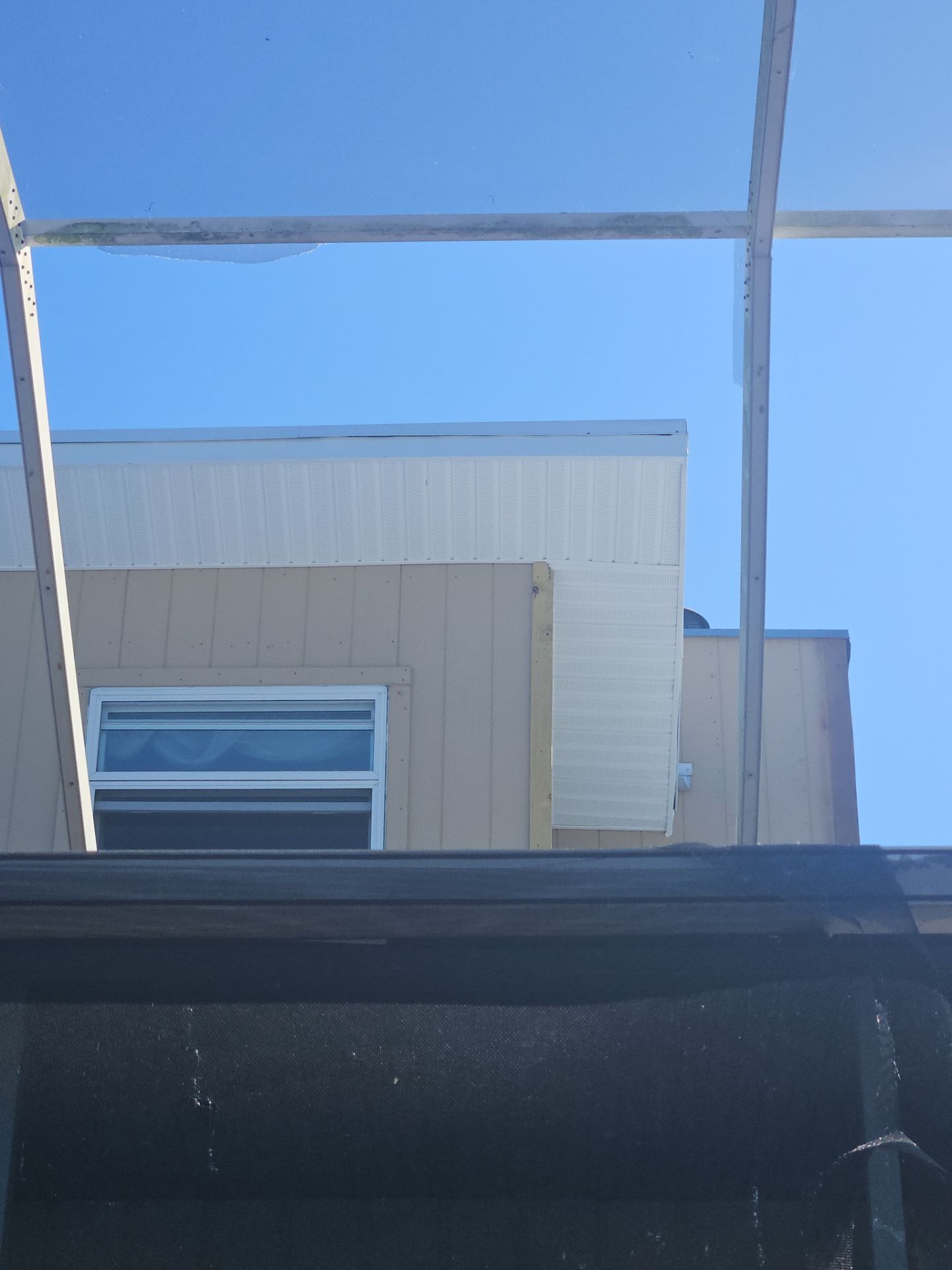 K-Style Seamless Gutter Installation using White Seamless Gutters in Sarasota FL by Gutter Professors