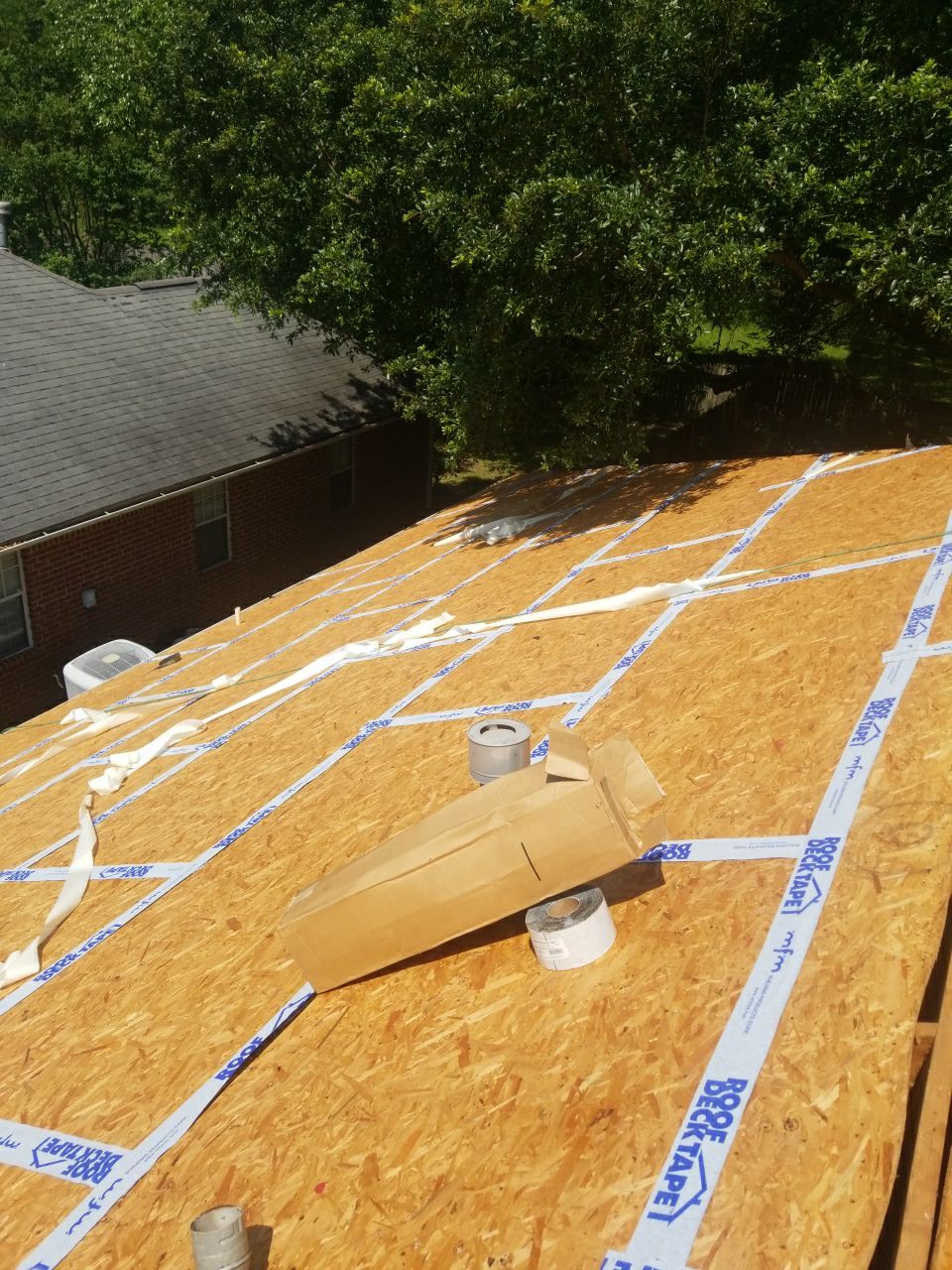 Residential Roofing Installation using Roof Replacement by American Roofing & Construction LLC