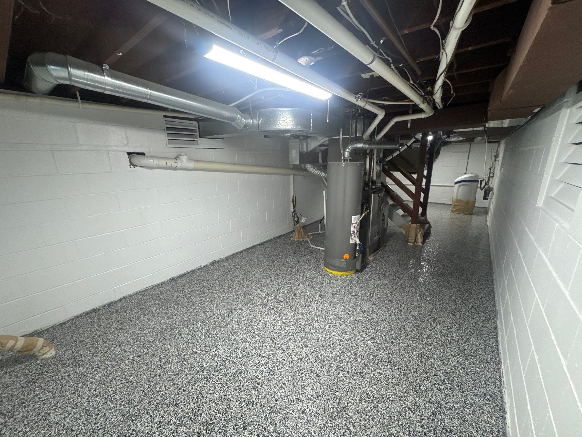 Repaint Walls and Apply Epoxy Flooring by Midwest Paint LLC
