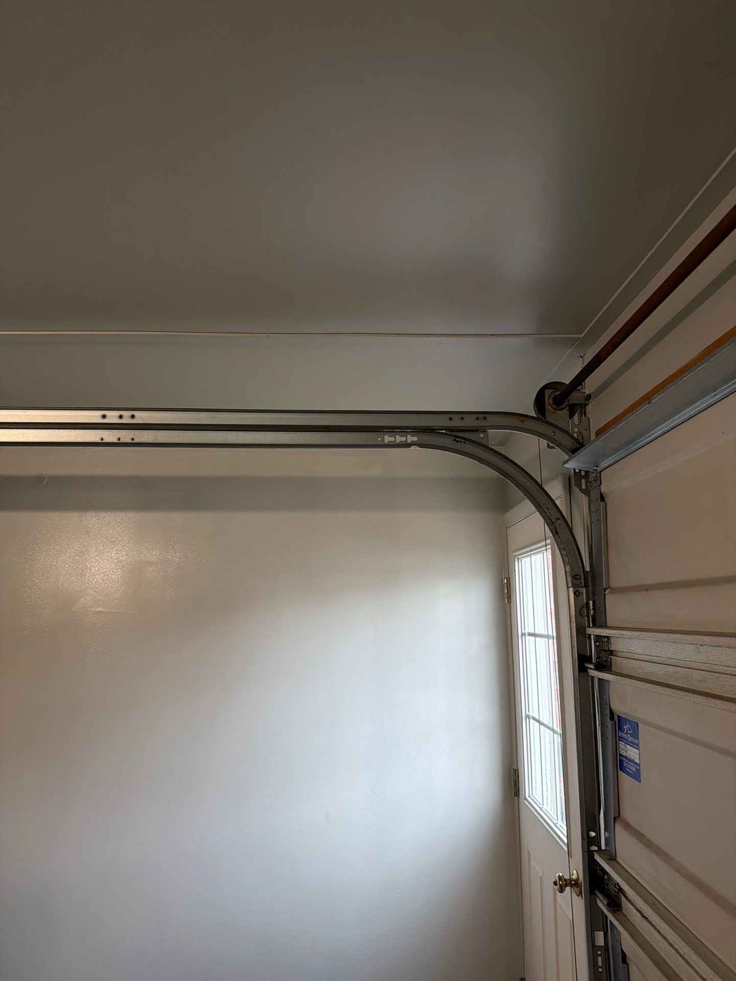 Muskegon Garage Interior Painting and Epoxy Flake Floor Installation by Gordon Painting