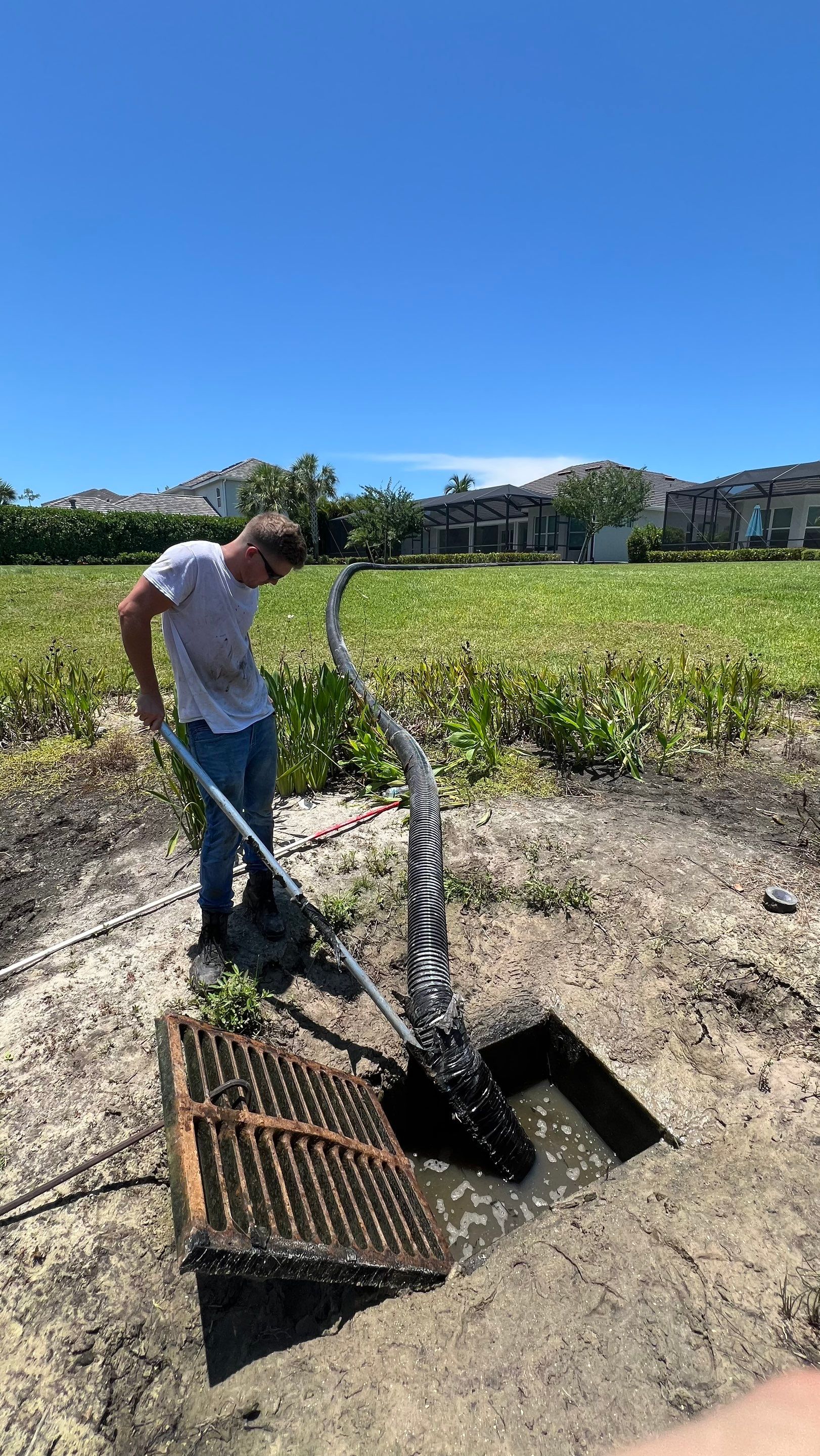 North Naples Community Stormwater Catch Basin Cleaning by APS Power & Water