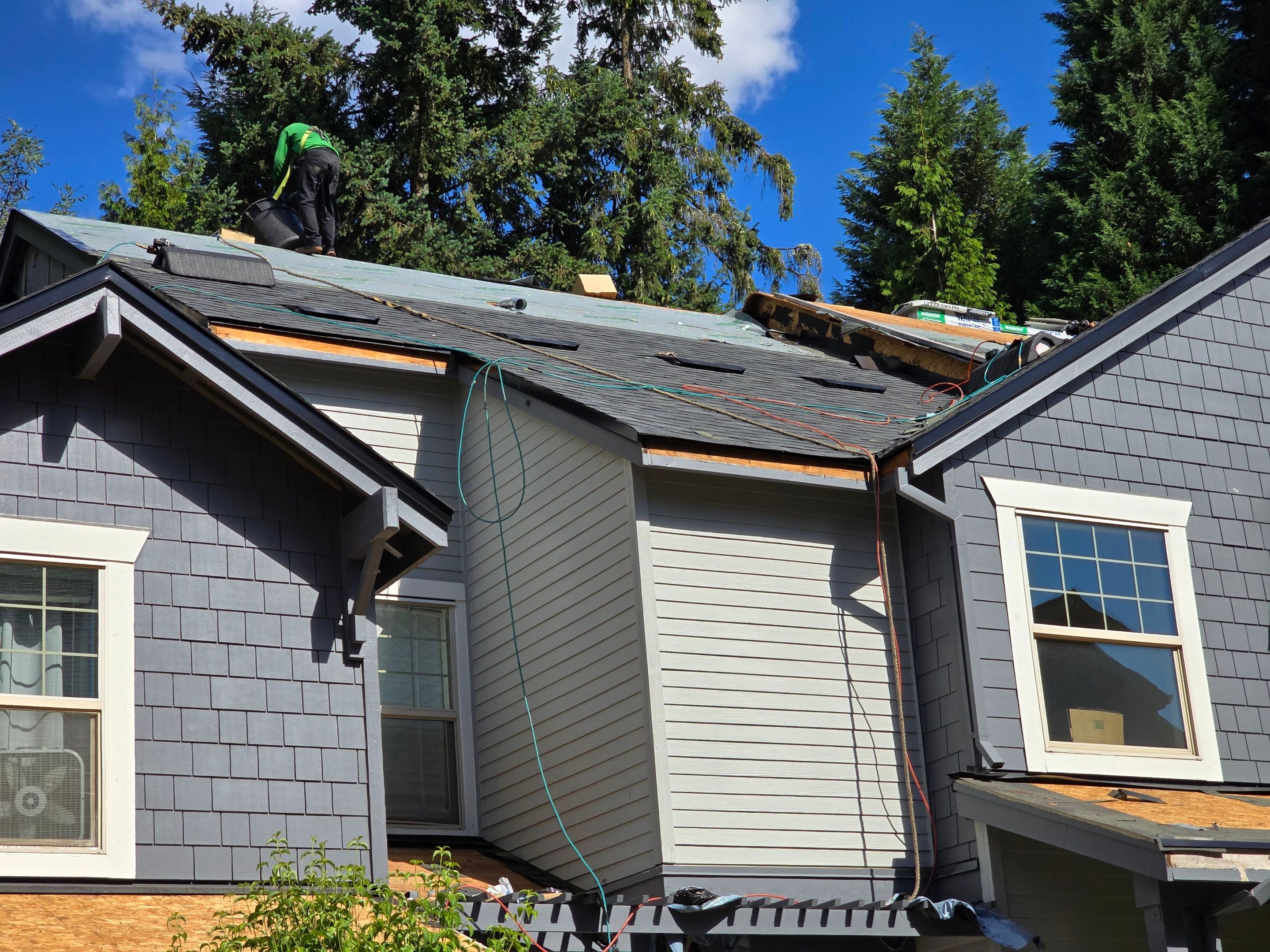 Dawson Station Reroof and Gutters by Hawthorne General Construction