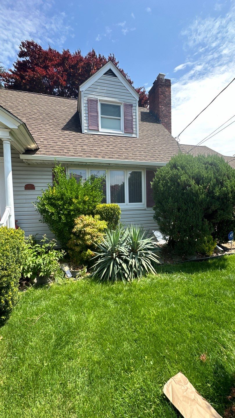 Full House Installation 5" white seamless gutters 2x3 leaders using 5"white K style seamless gutters and 2x3 white leaders by Above All Gutters 
