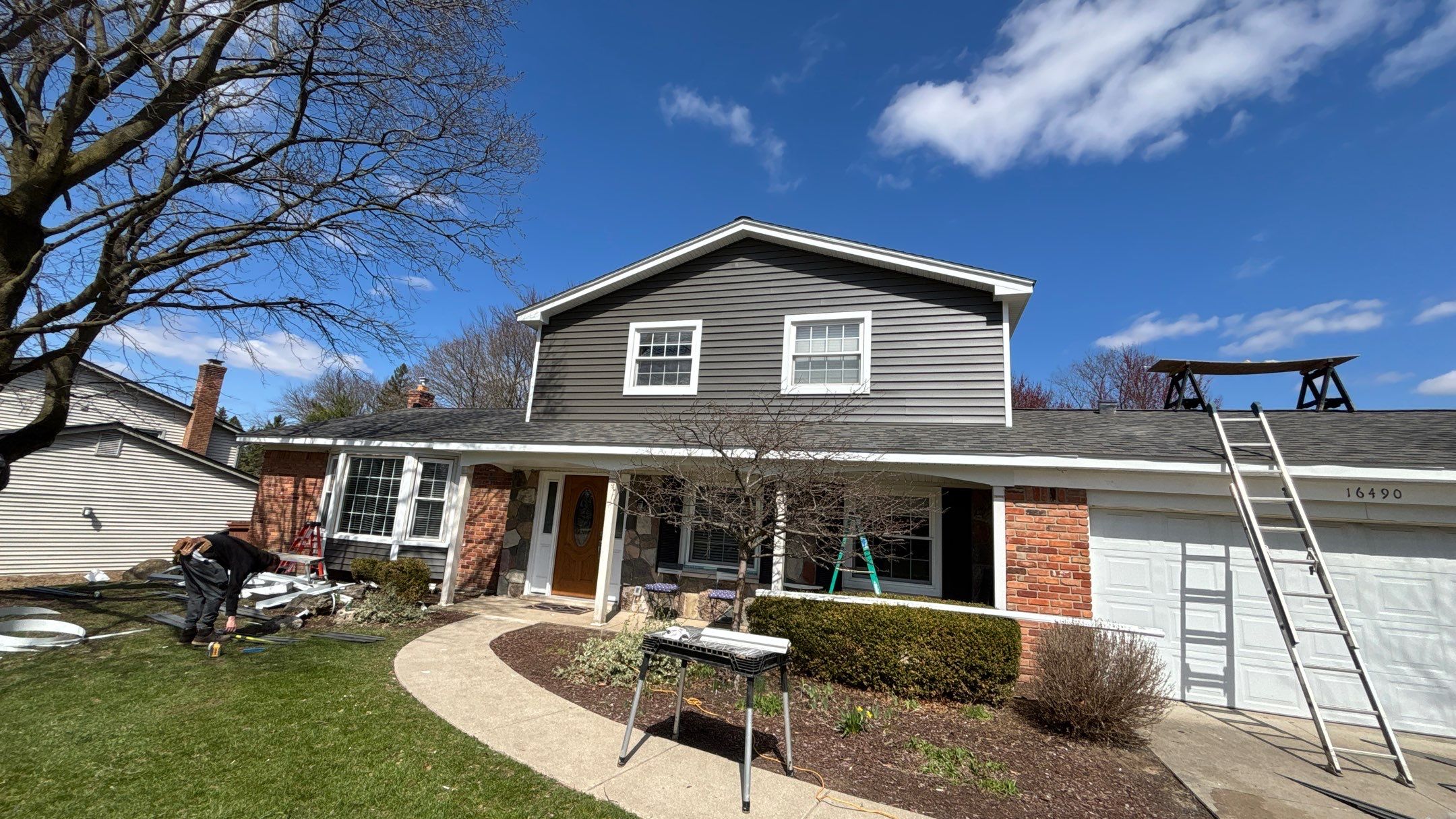 Siding Replacement using Alside Charcoal Smoke and Roof Replacement using Owens Corning Peppercorn by 180 Contractors