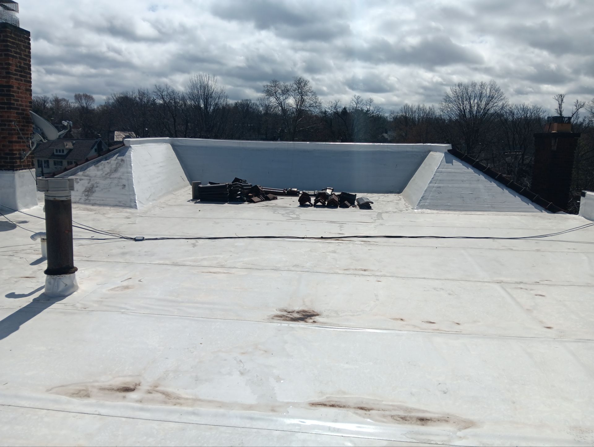 Commercial Roofing Installation using Duro-Last 50 mil PVC by 3 Daughters Construction 