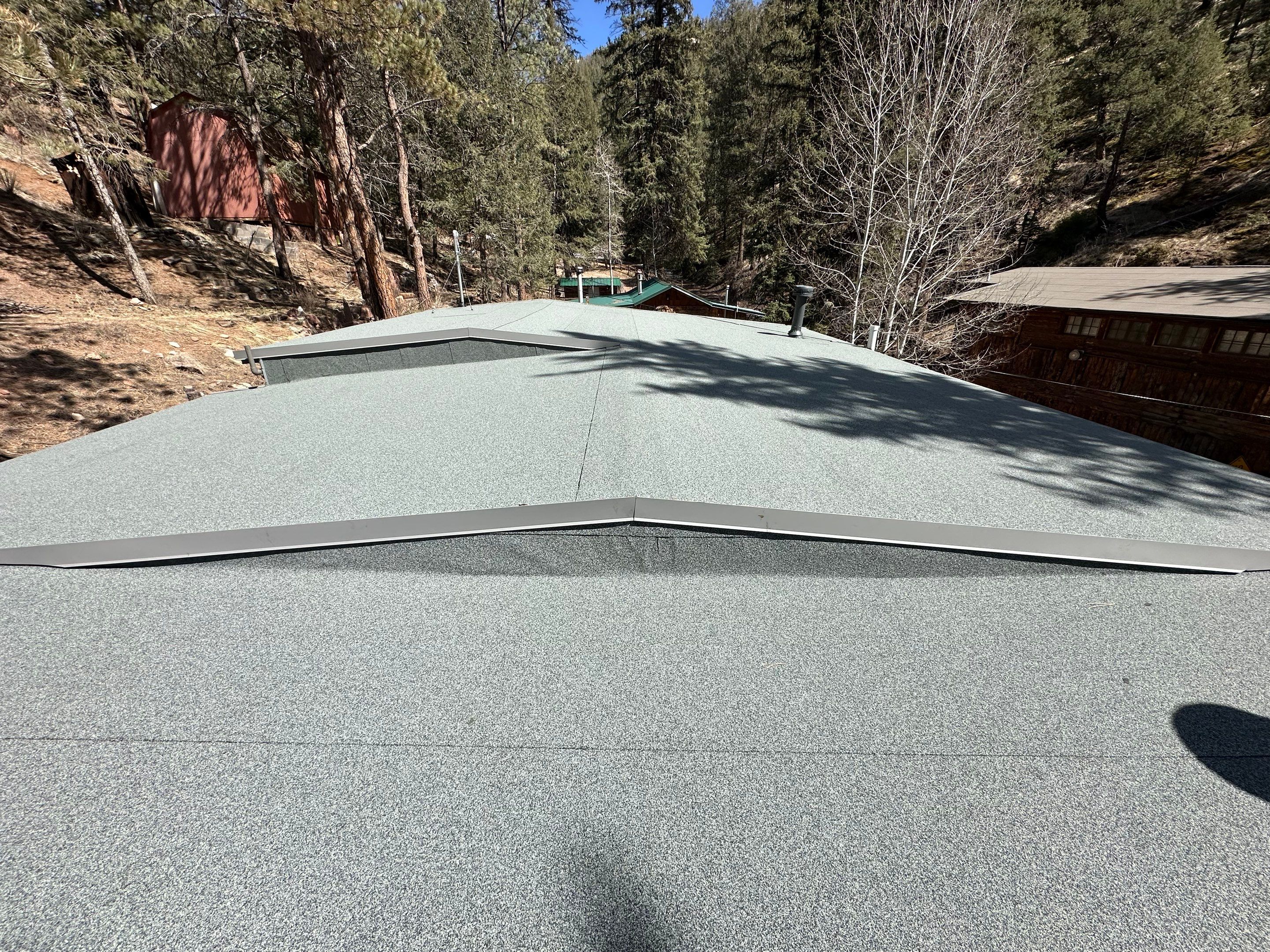 Residential Roofing Installation using Modified Bitumen Roofing by Blue Peaks Roofing LLC 