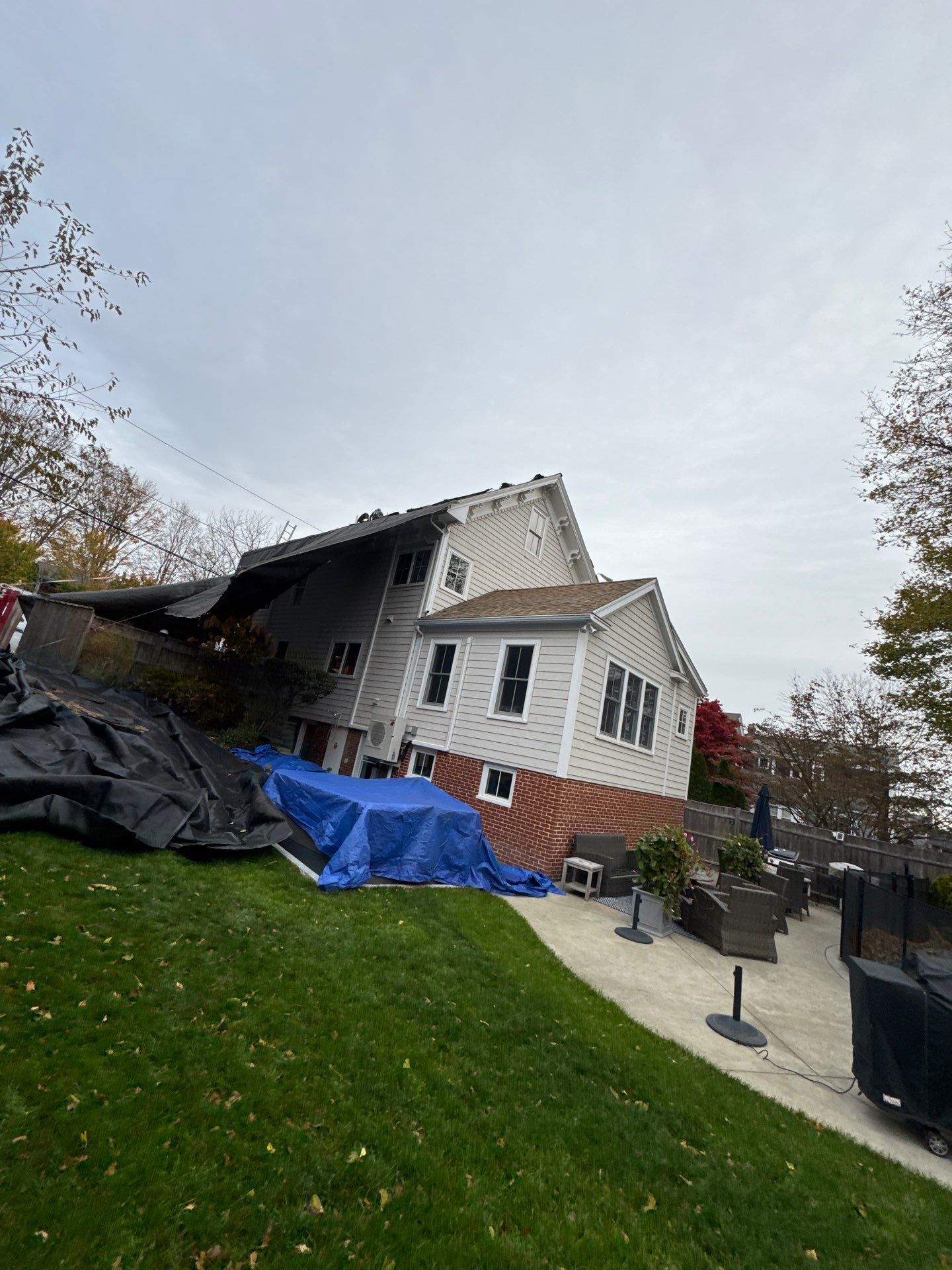 Newburyport Complete Roof Replacement with Solar Venting Skylight by Mighty Dog Roofing of Greater Middlesex County