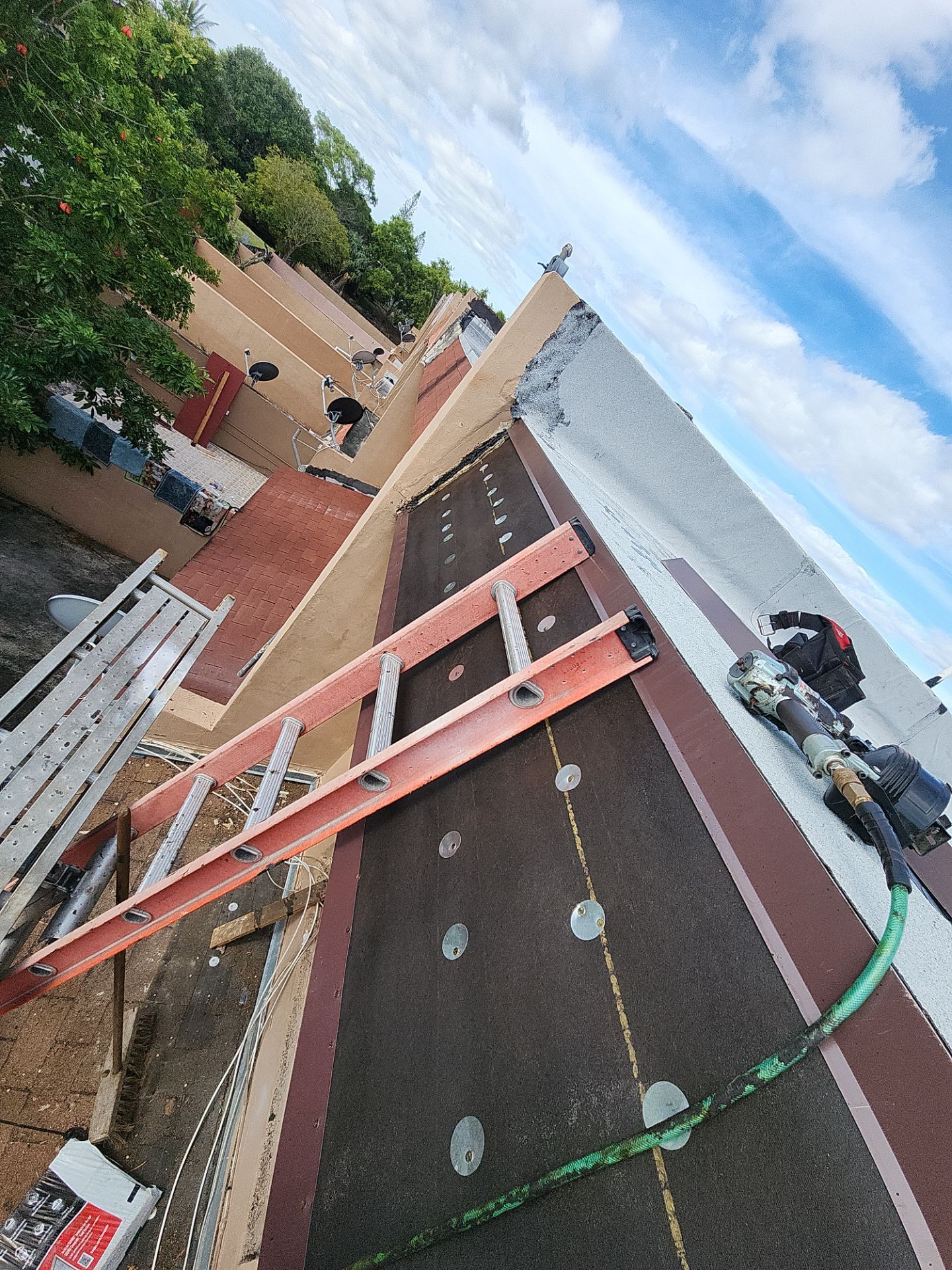 Mansard shingles and flat by Windows Roofs Plus Inc.