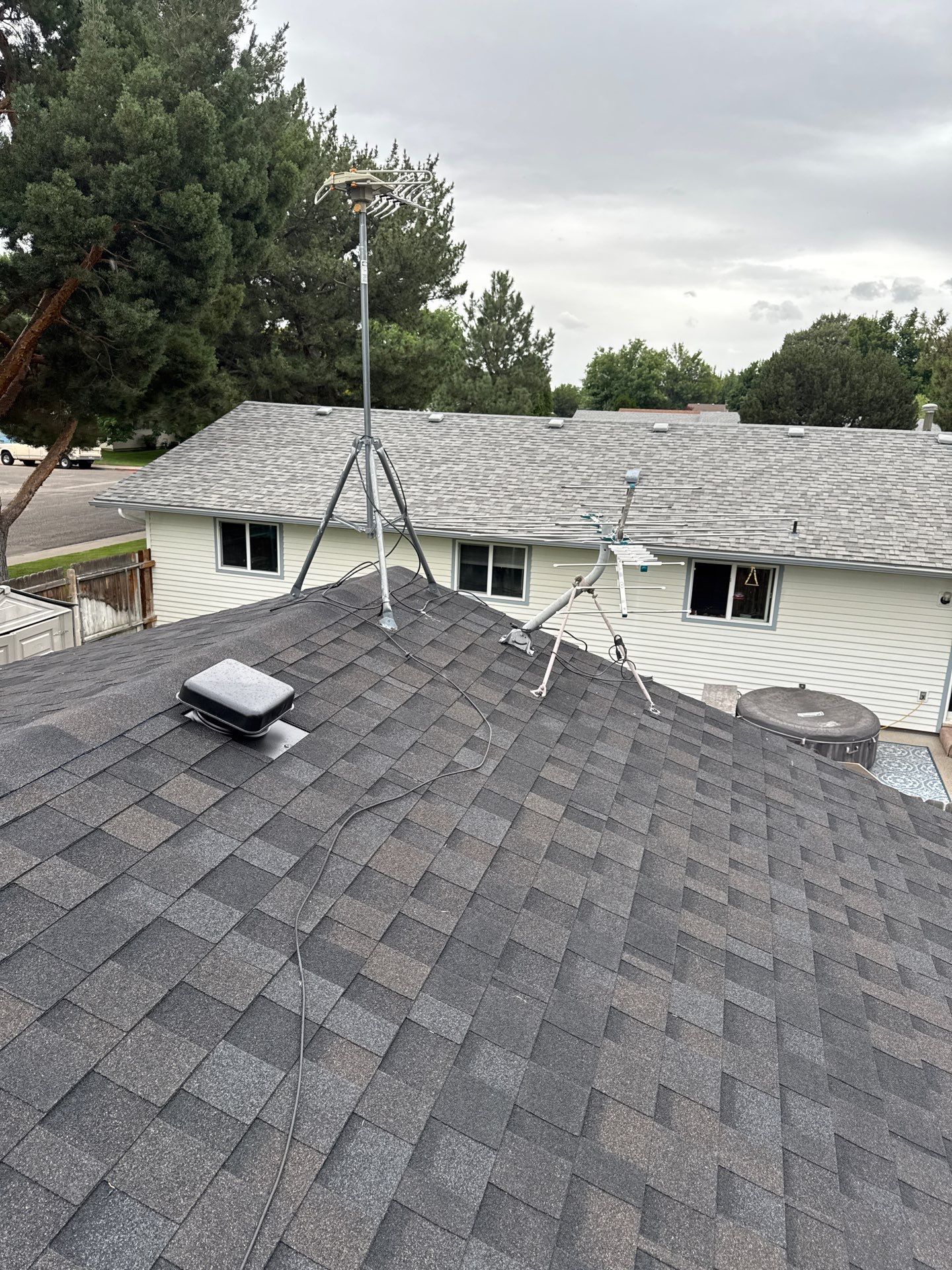 Residential Roof Replacement With Dark Gray Architectural Shingles in Mountain Home by Olive Roofing