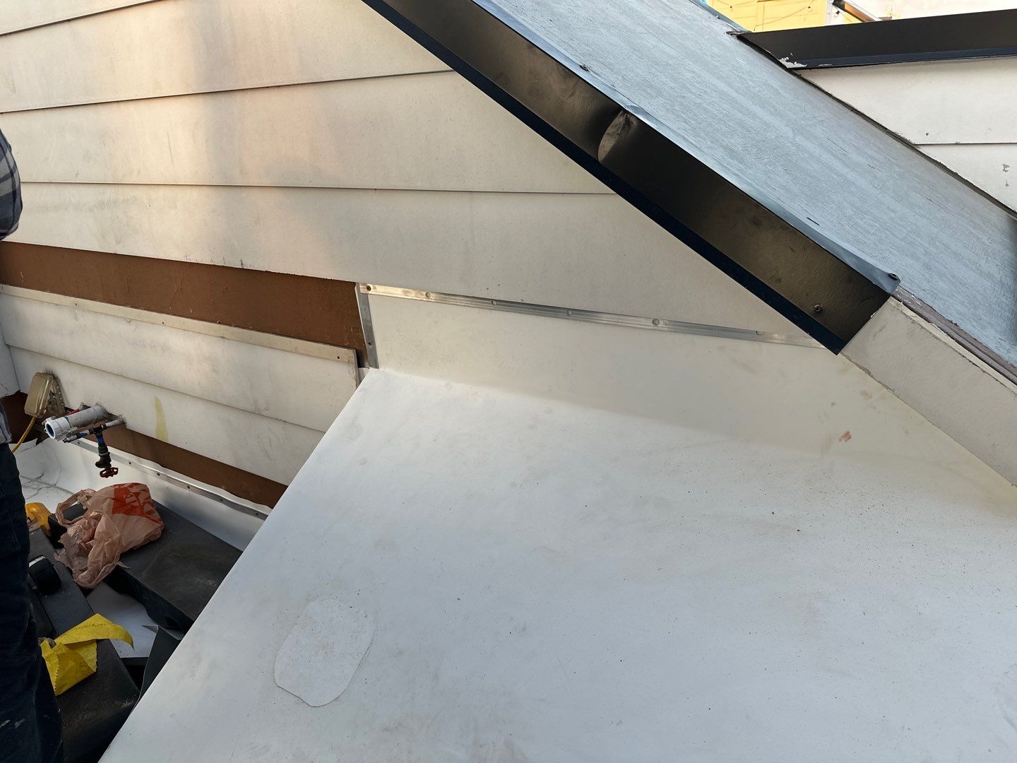 TPO Roofing System with Roof Deck Pavers by Undersun Roofing 