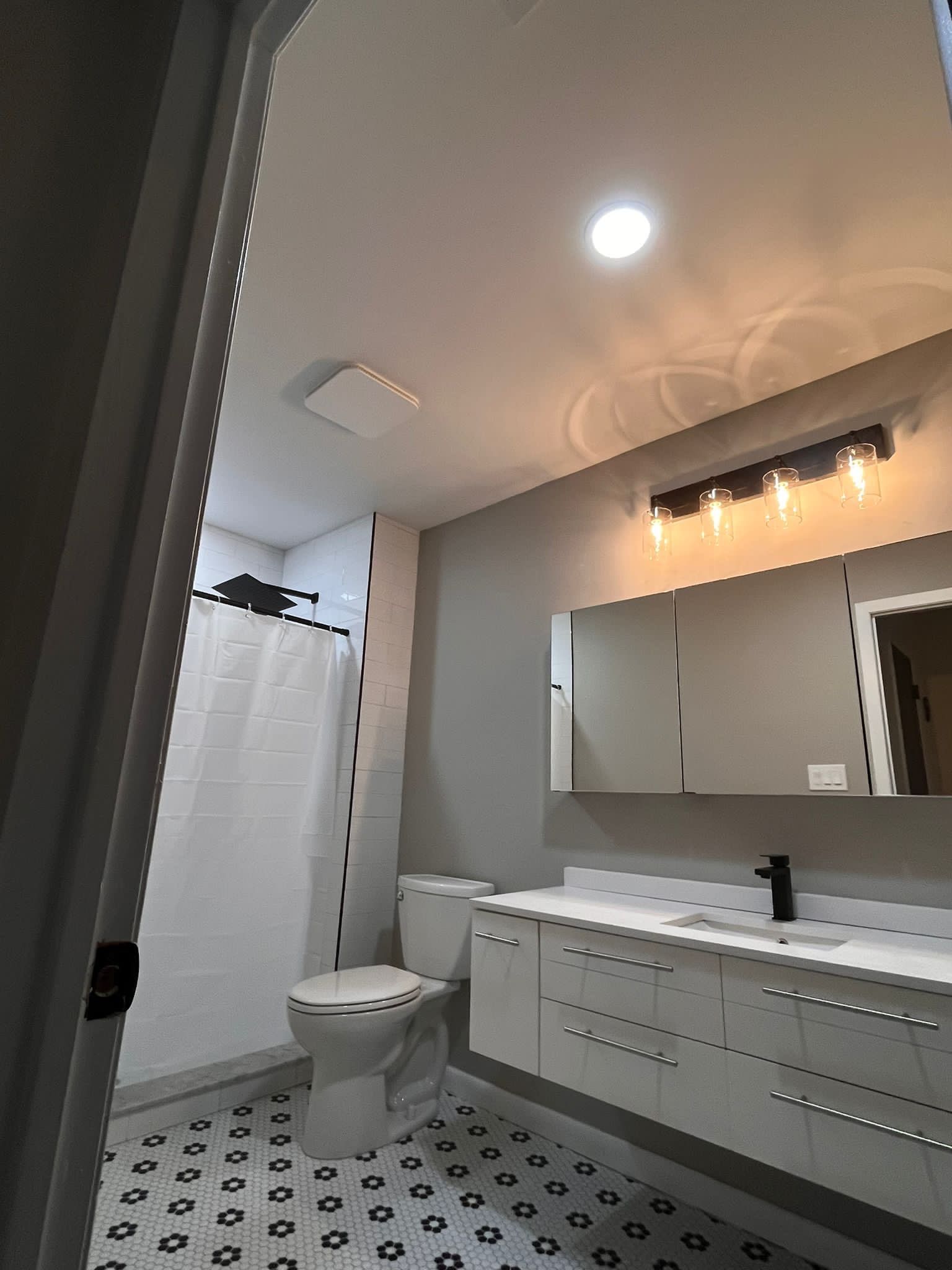 Bathroom Remodel using Tile by Home Concepts Construction