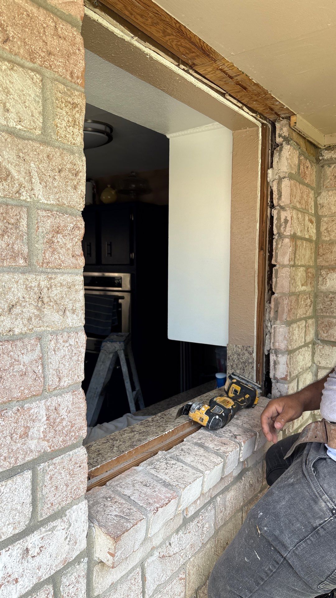 Colored Vinyl Windows to blend into brick by Bayfront Roofing and Construction