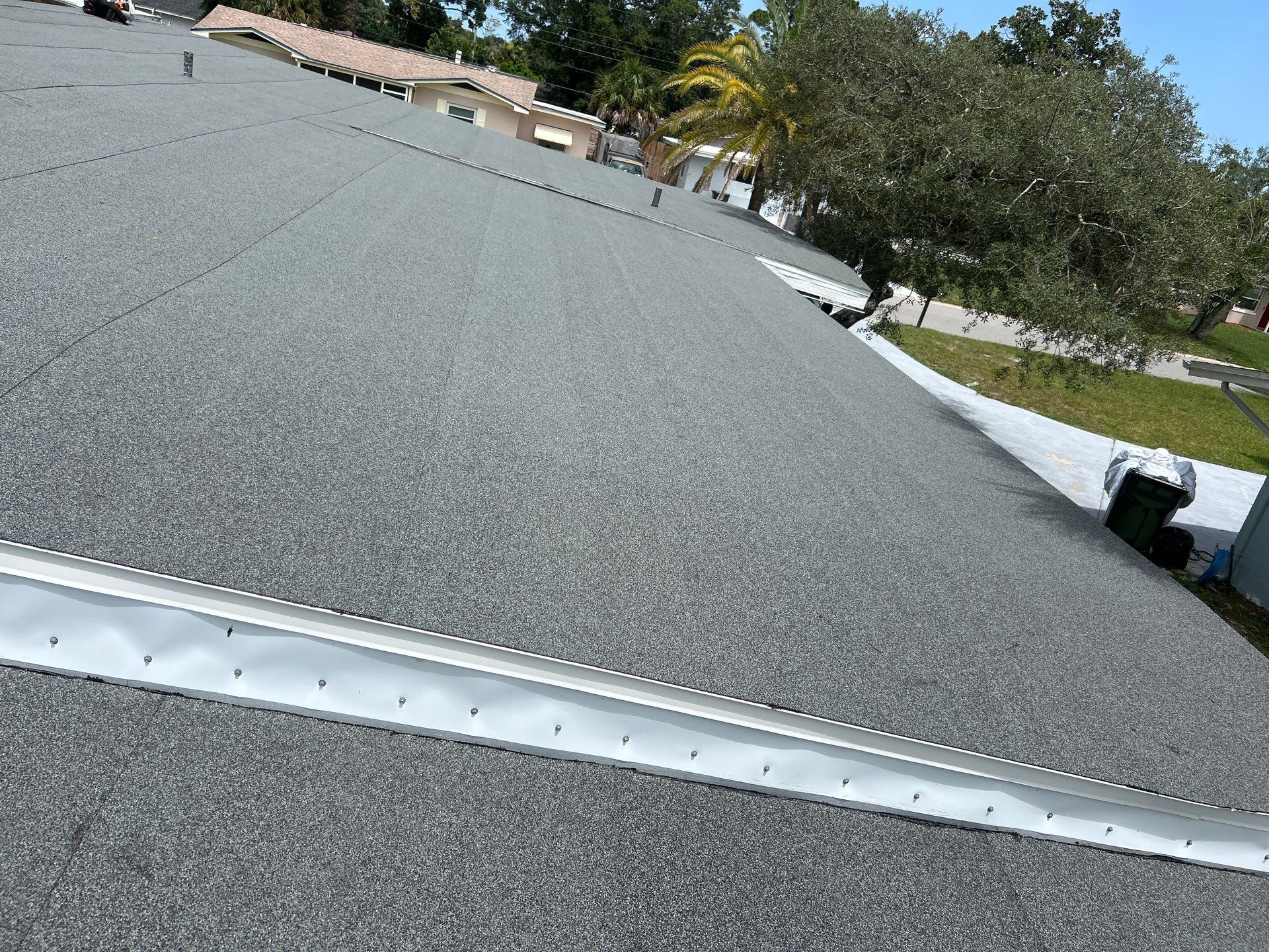 Colonial Slate Modified Bitumen Flat Roof Replacement in Daytona Beach by Pinnacle Roofing Group