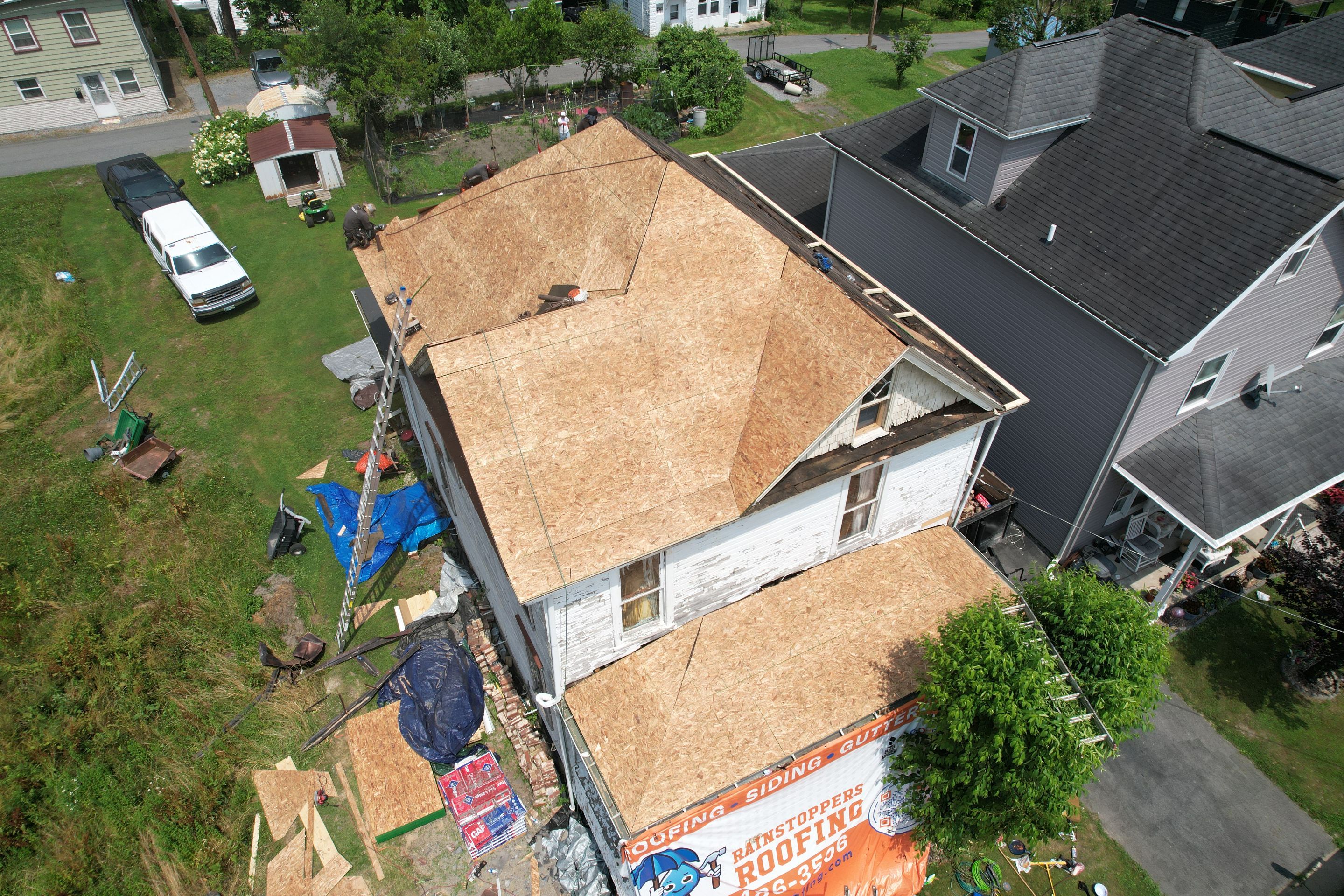 Residential Roofing Installation using GAF Timberline HDZ Charcoal by Rainstoppers Roofing