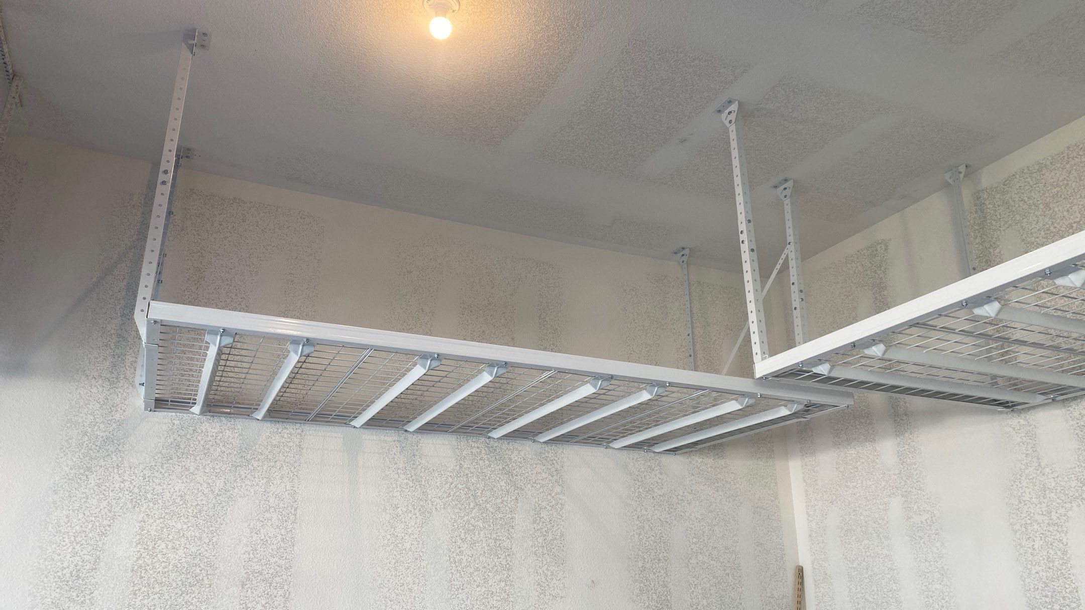 Roger D. adds ceiling racks to his garage! by Banner Garage