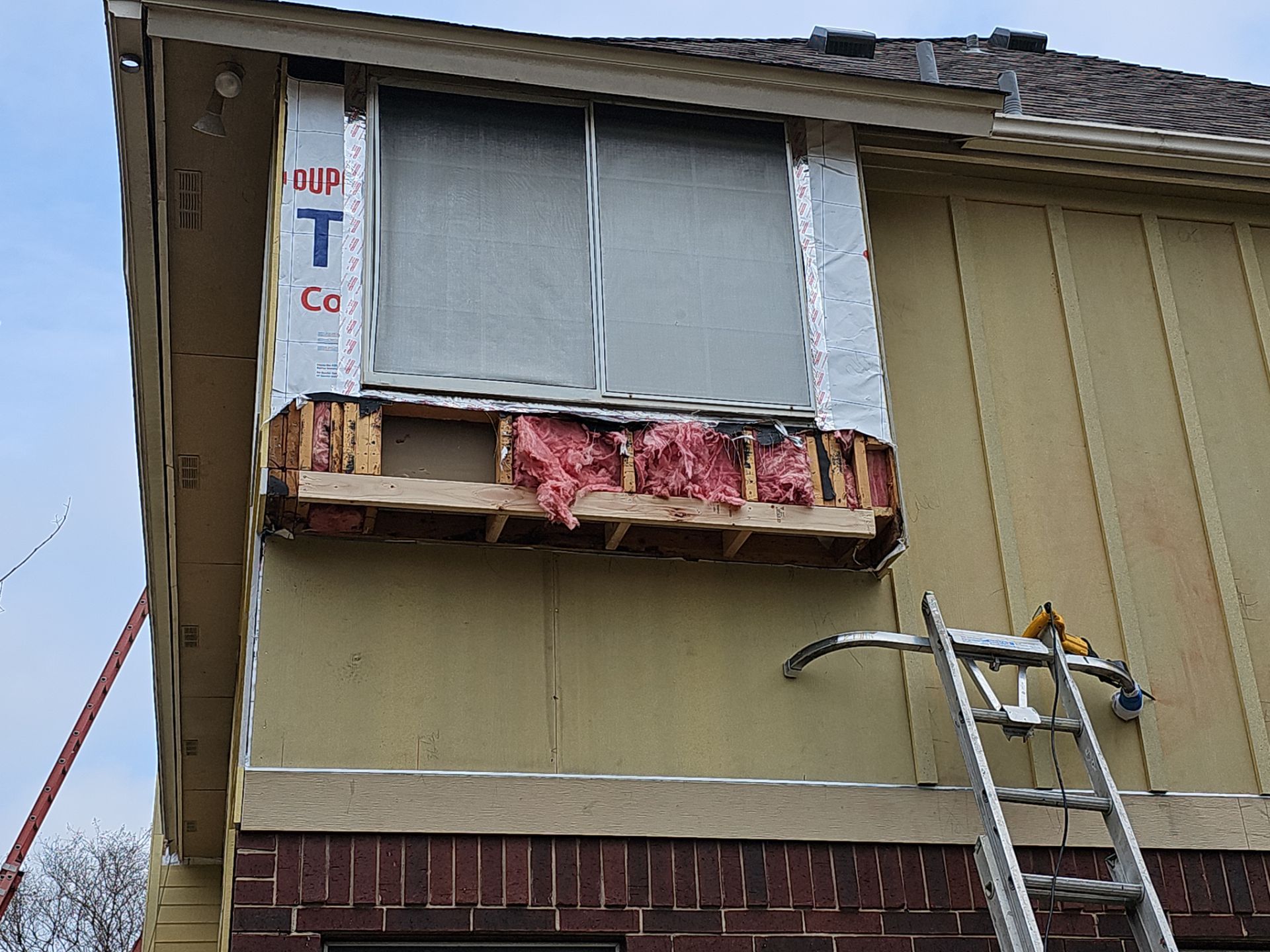 New Hardie Lap Siding & Board and Batten by DeZign Roofing & Exteriors