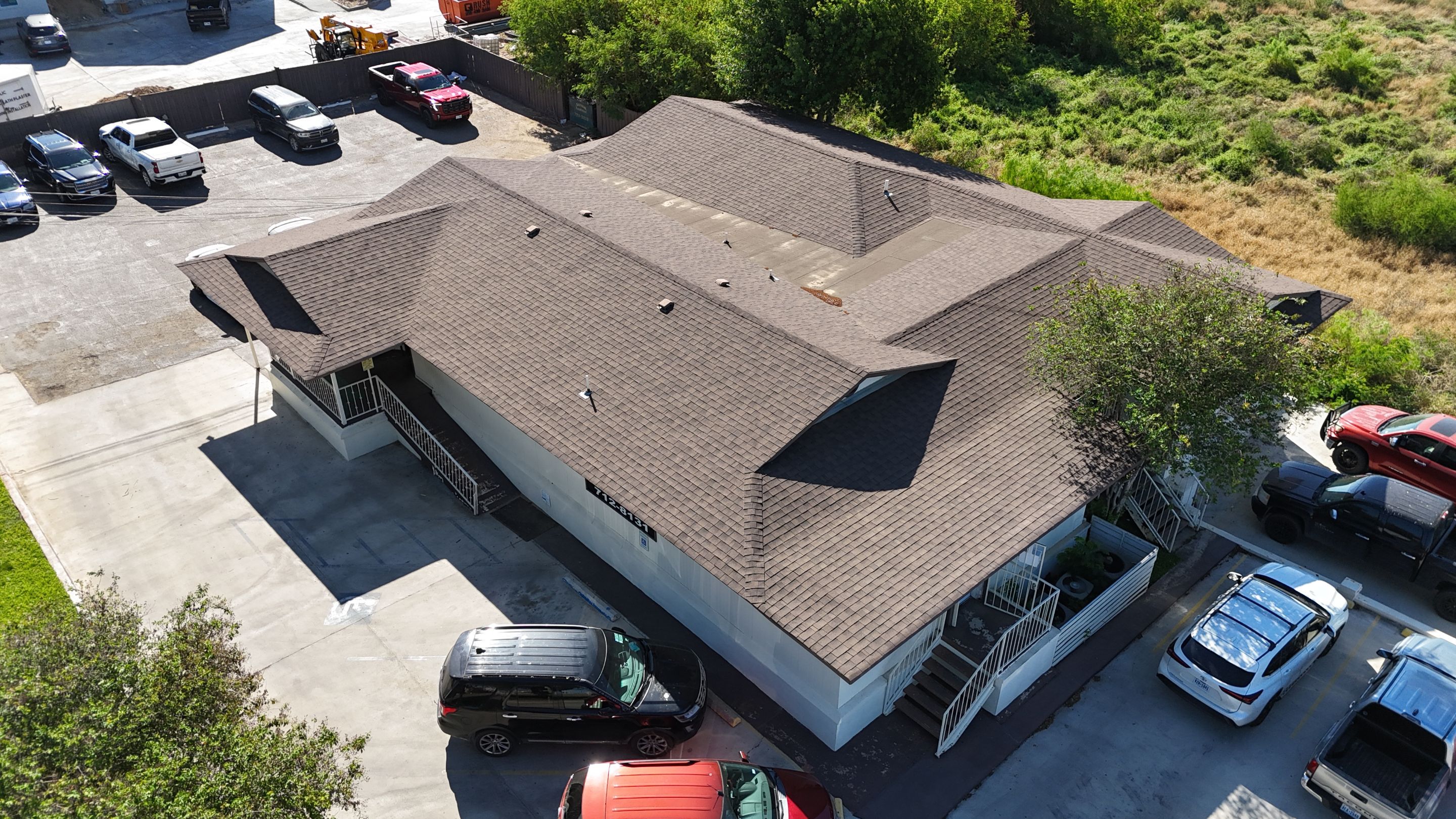 Copper Standing Seam Metal Roof Installation for Laredo Medical Clinic by JM Flores Roofing & Construction, Inc