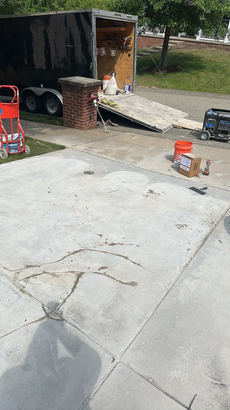 Pool Deck + Driveway + Garage Project in Venetia by Floors in a Day, Inc