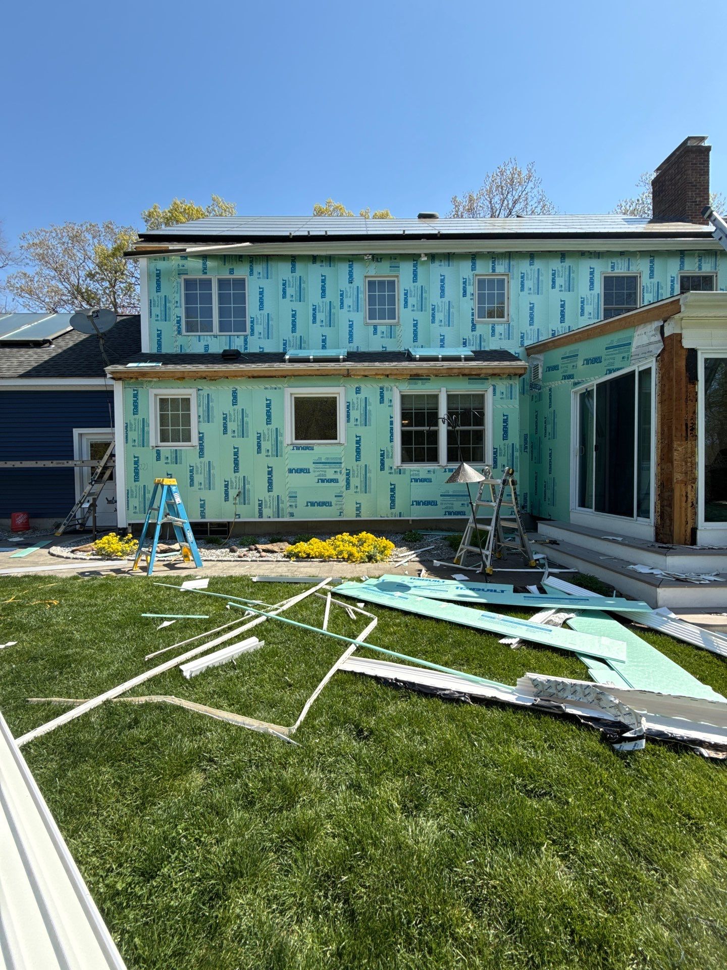 Siding facelift with Cert Monogram D/4 x16'8" clapboard, Midnight Blue & Cert Monogram D4x25' clapboard, Midnight Blue by DiGiorgi Roofing and Siding Inc