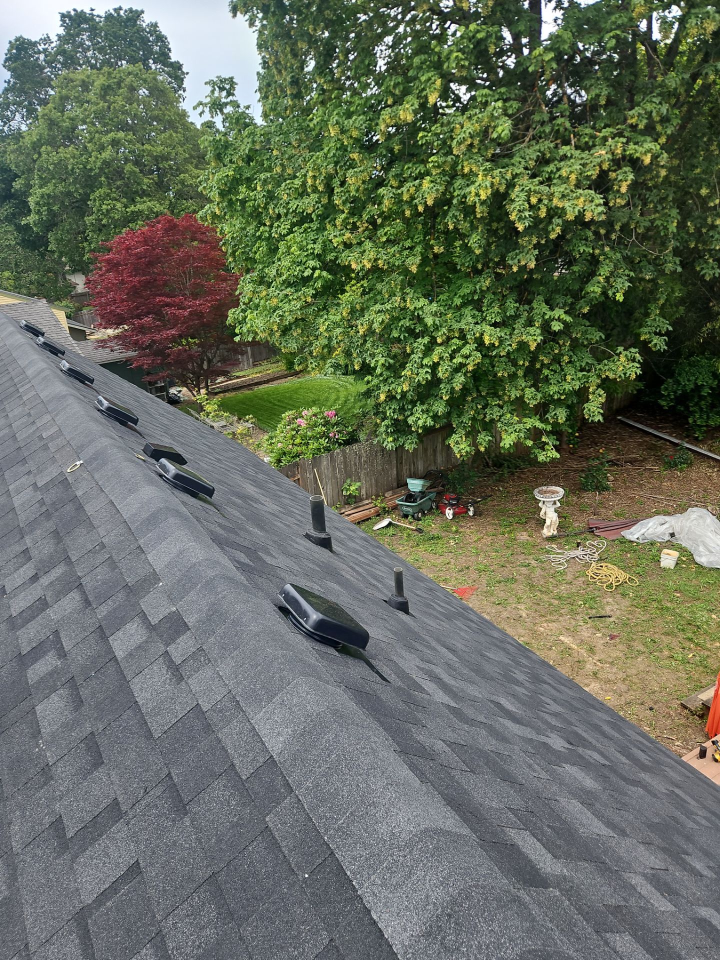 Residential Roofing Installation using IKO Dynasty (Color: Granite Black) by Orezona Building & Roofing Company, Inc.