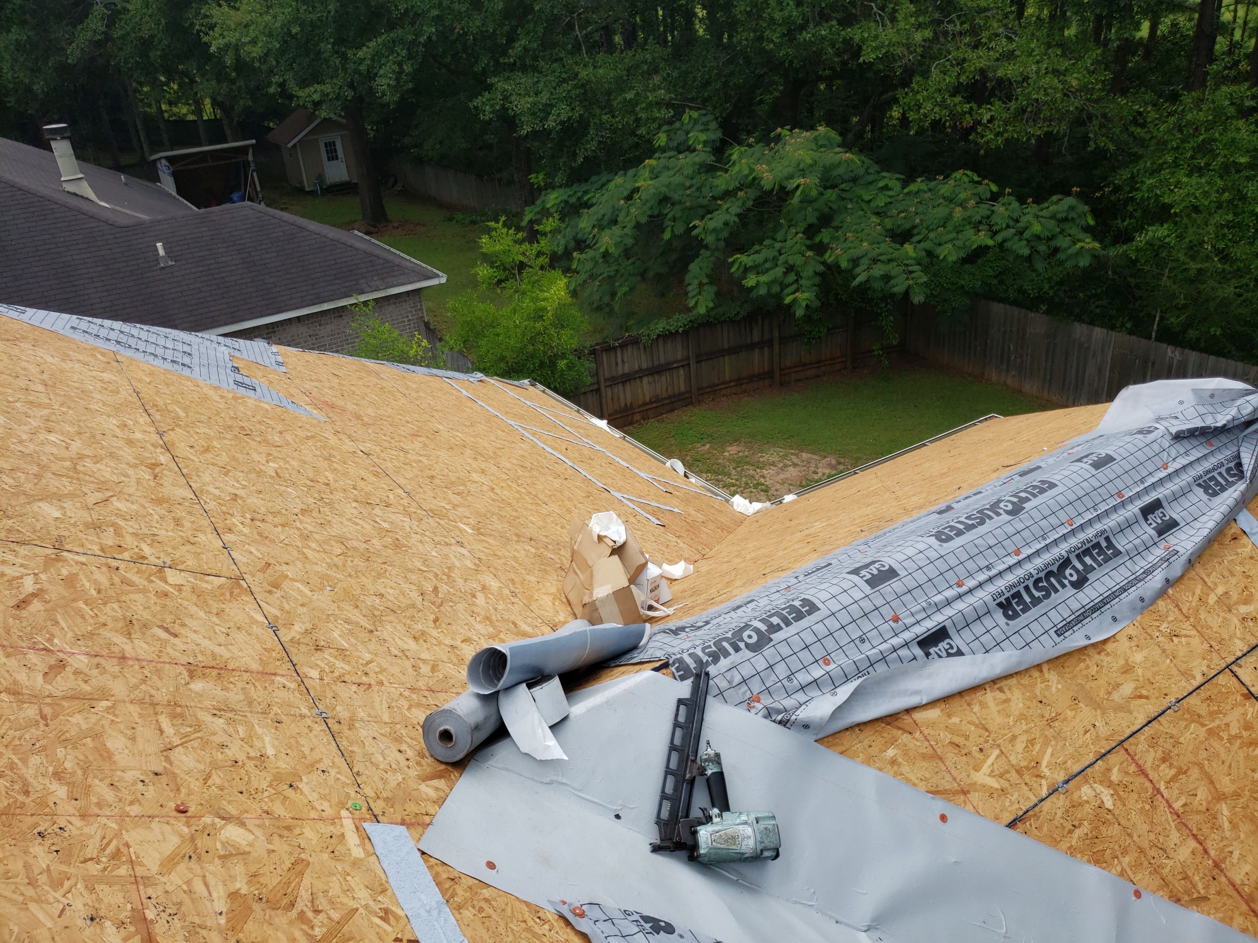 Residential Roofing Installation using Roof Replacement by American Roofing & Construction LLC