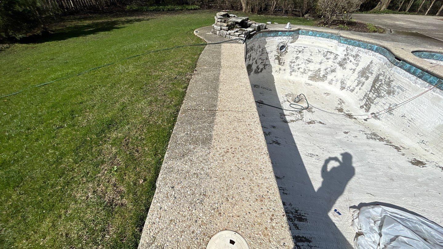 Aggregate Clean and seal using low gloss sealer by Northern Power Washing LLC.
