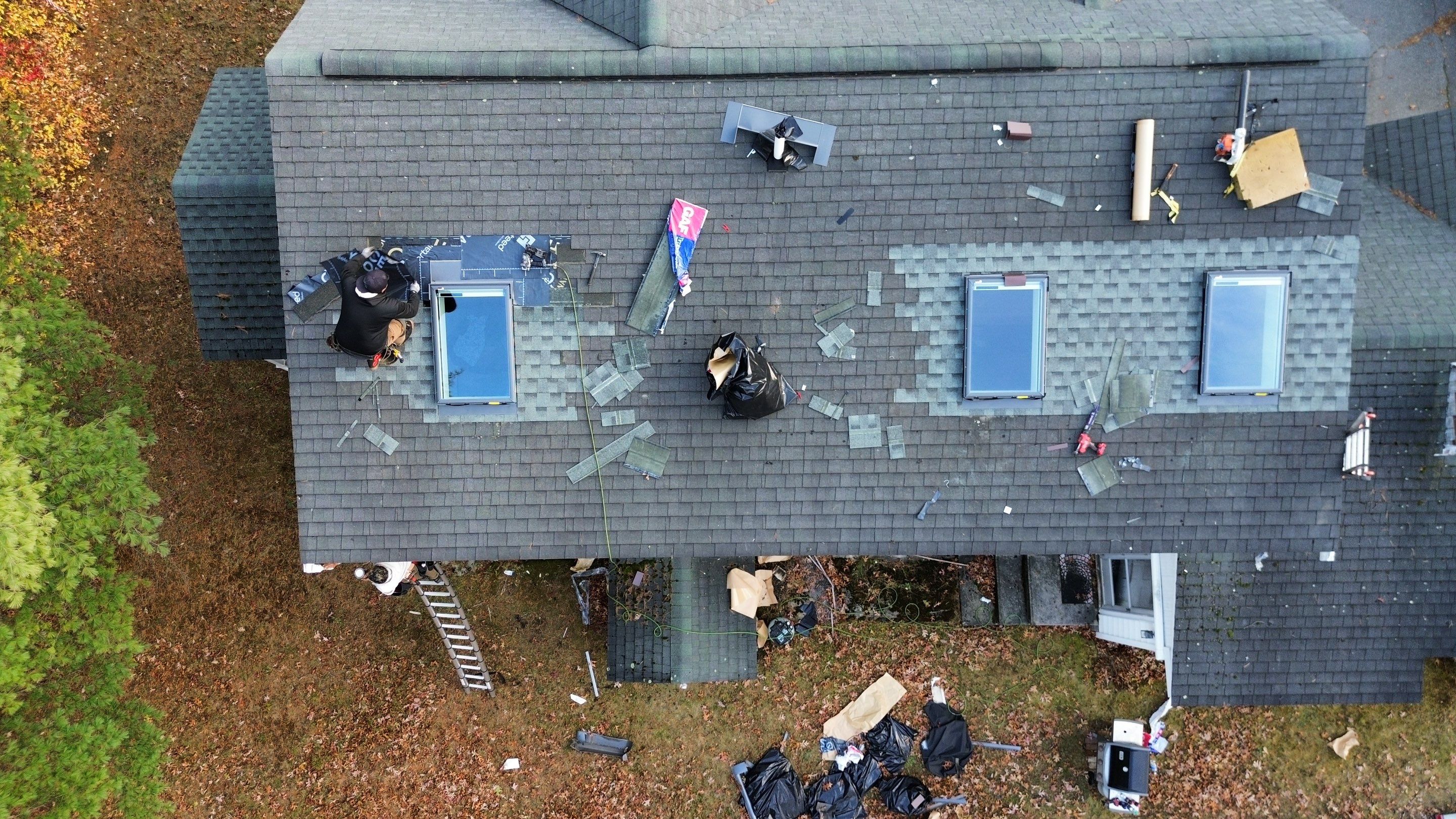 Chelmsford Triple Skylight Leak Repair with Fascia & Shingle Restoration by Mighty Dog Roofing of Greater Middlesex County