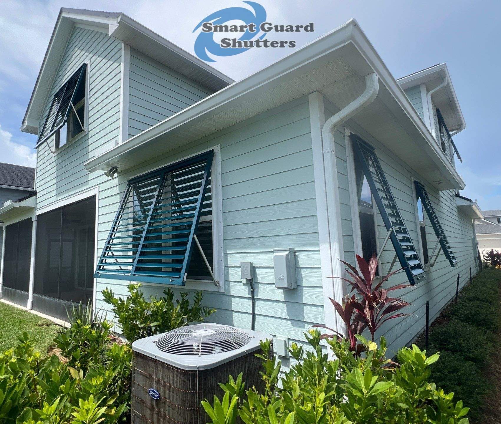 Impact Bahama Shutters in Ocean Blue by Smart Guard Shutters