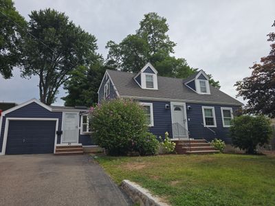 Complete Exterior Transformation - James Hardie Siding, Windows & Doors
