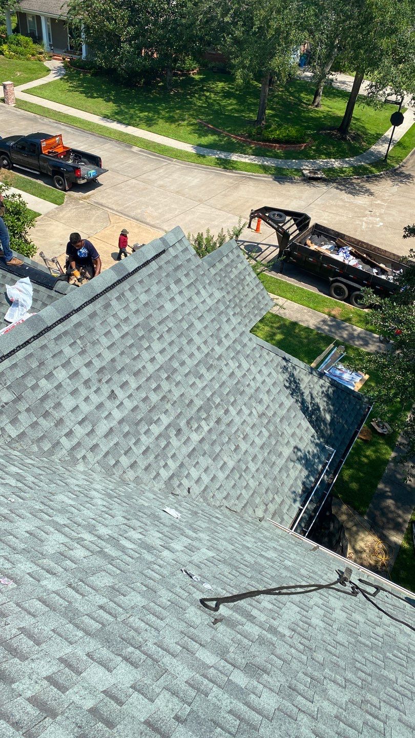 Residential Roofing Installation using Roof Replacement by American Roofing & Construction LLC