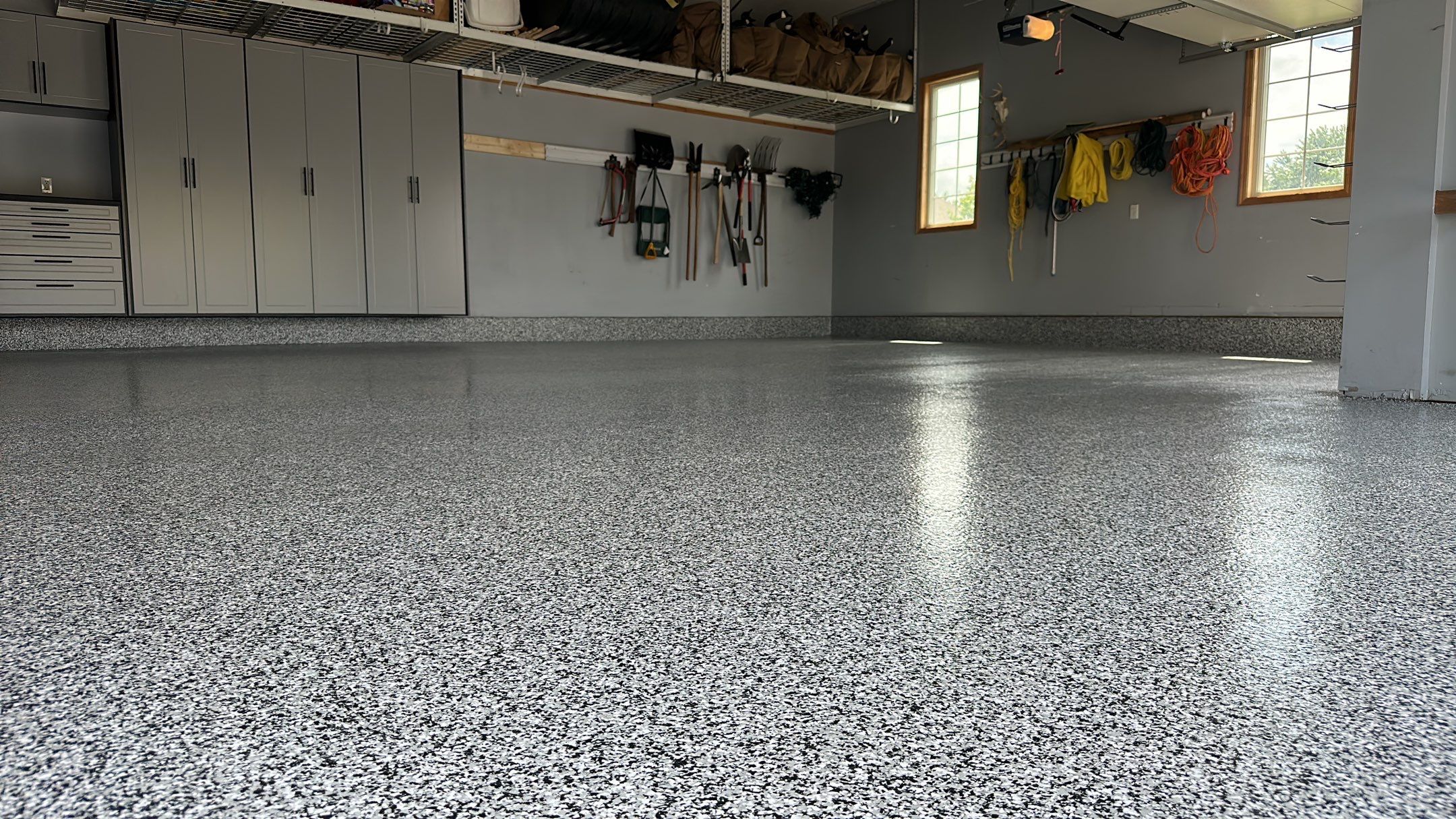 Matt N. took his garage to the next level with our Domino floor and cabinets by Banner Garage