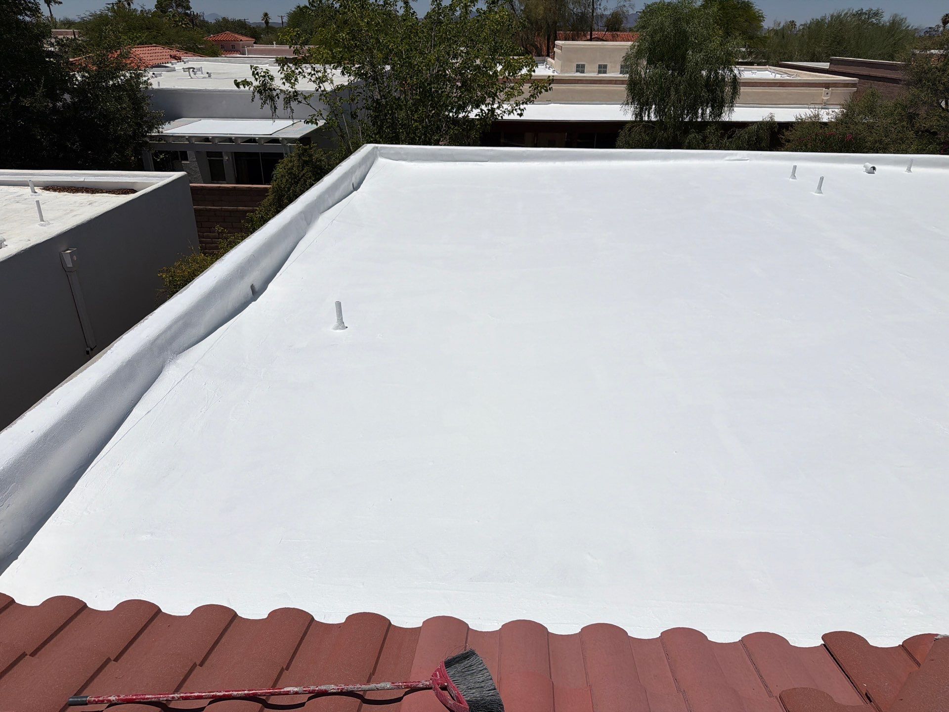 Tucson Residential Roof Restoration with Tile and Elastomeric Coating by West Coast Roofing AZ