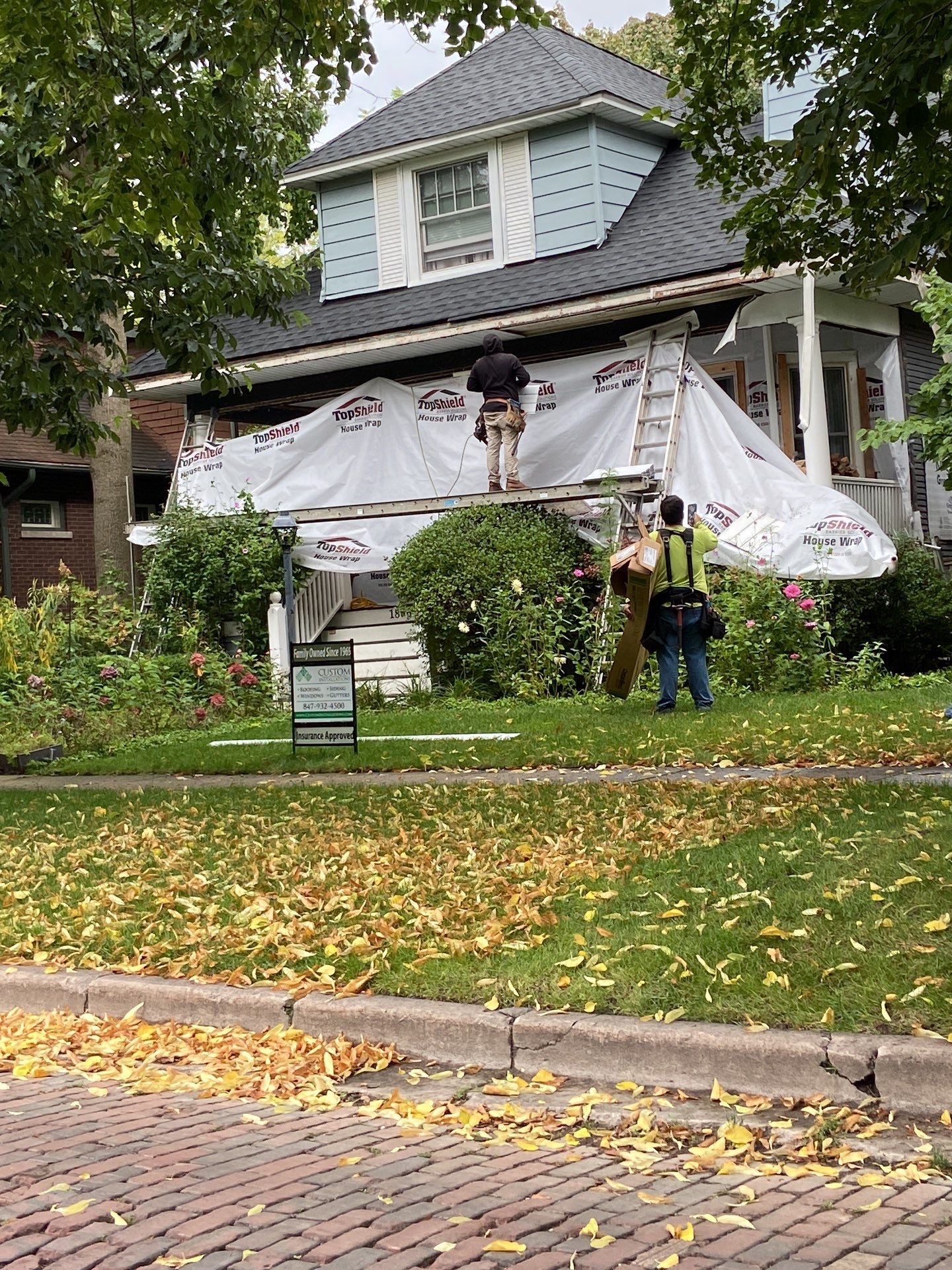 Asphalt Roof, Vinyl Siding, and Aluminum Gutter Replacement by Custom Installations