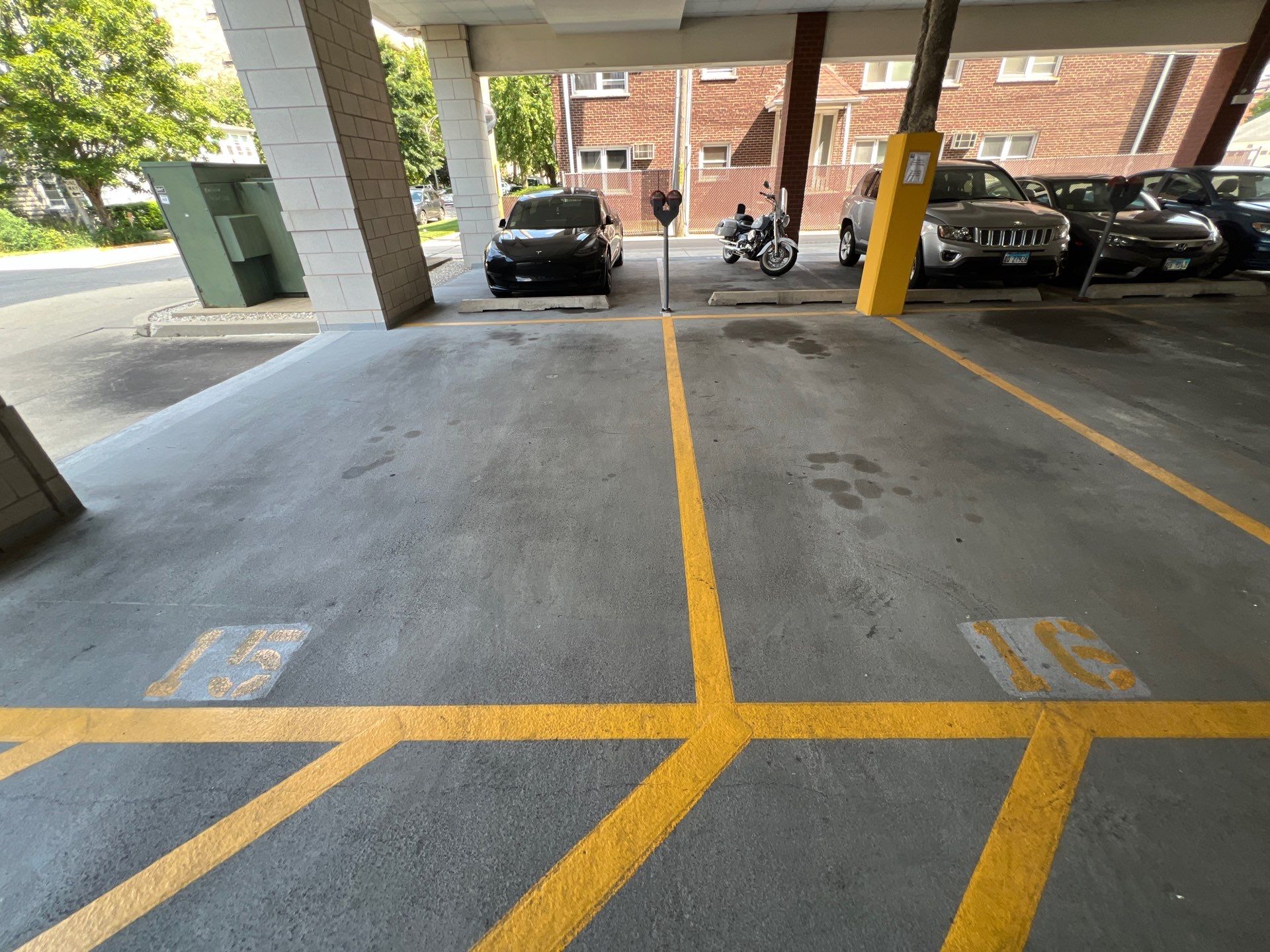 Parking garage using Hot water by Northern Power Washing LLC.