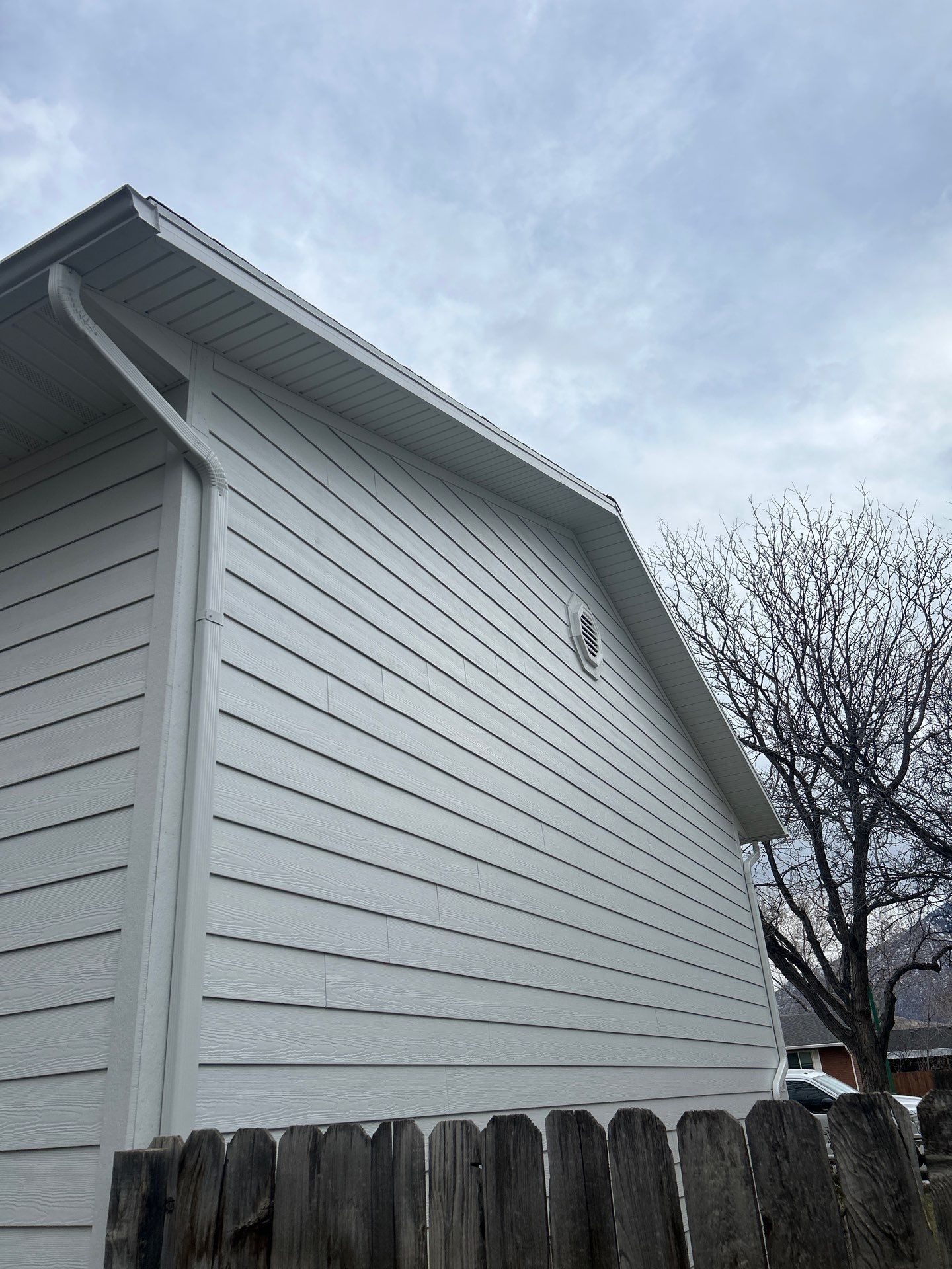 Orem | Crisp Monochromatic Hardie Upgrade | Arctic White by Ideal Siding Utah