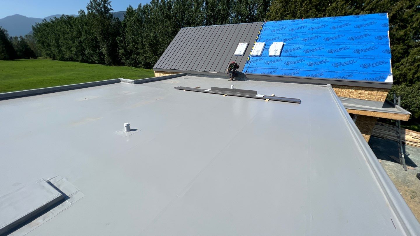 Residential Roofing Installation using multiple products by Top Notch Roofing Inc