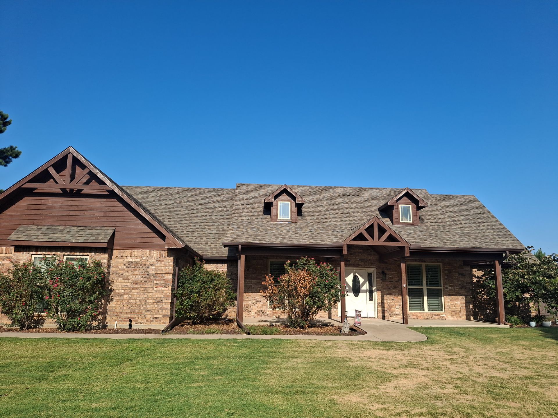 From Dated Brown to Modern Contrast: A Mineola Exterior Transformation by Quality Coats Painting