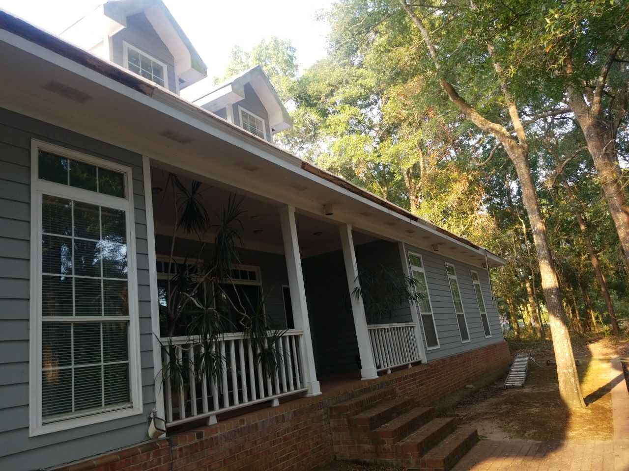 Residential Roofing Installation using Roof Replacement by American Roofing & Construction LLC