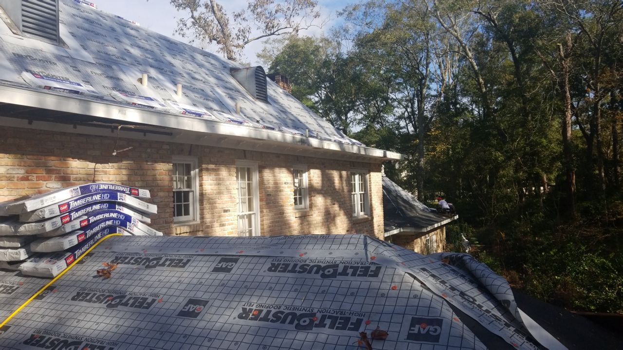 Residential Roofing Installation using Roof Replacement by American Roofing & Construction LLC