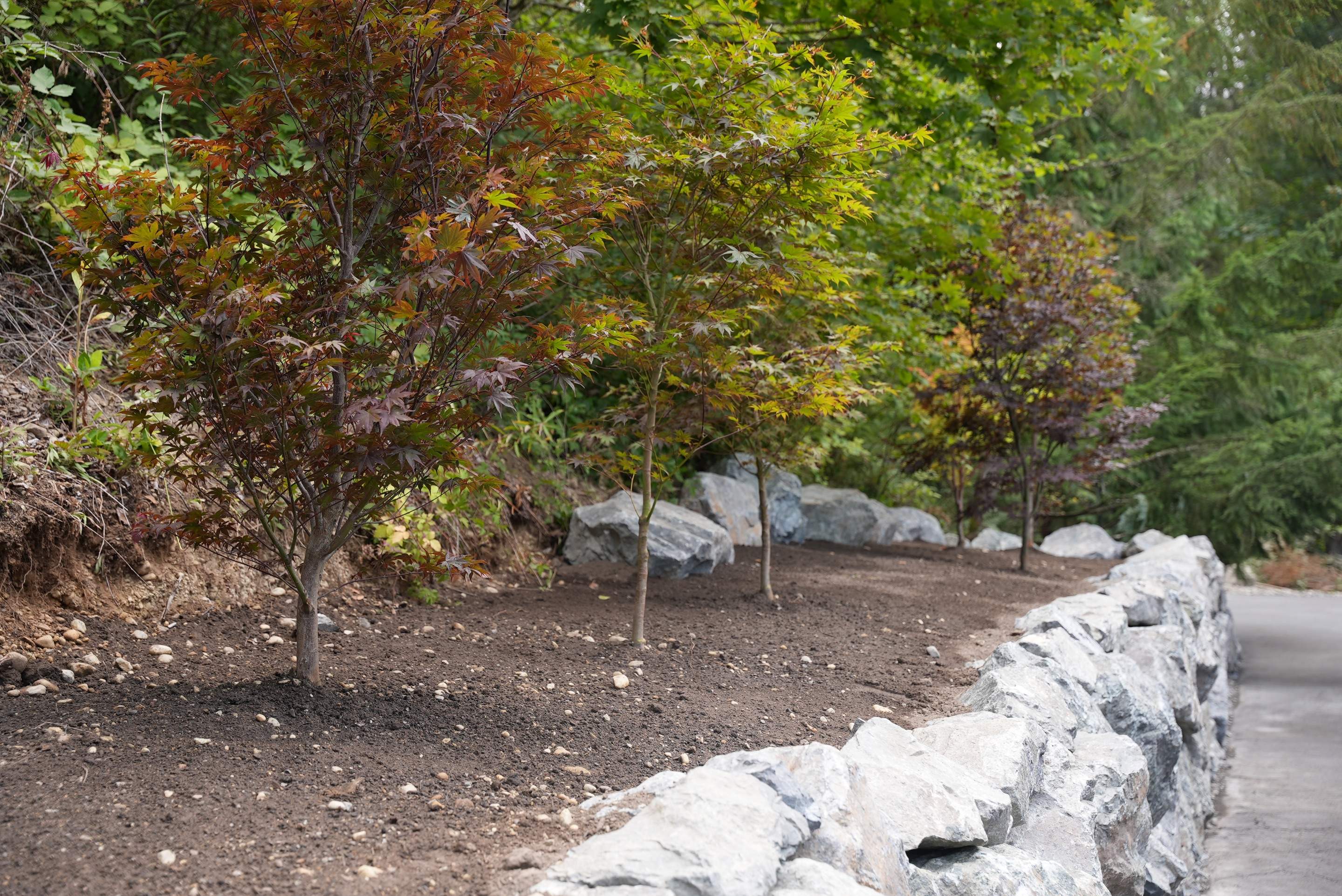 Jim | Rockery Wall, Landscaping, Road Repair & Sealcoating by Jireh Asphalt & Concrete Inc 
