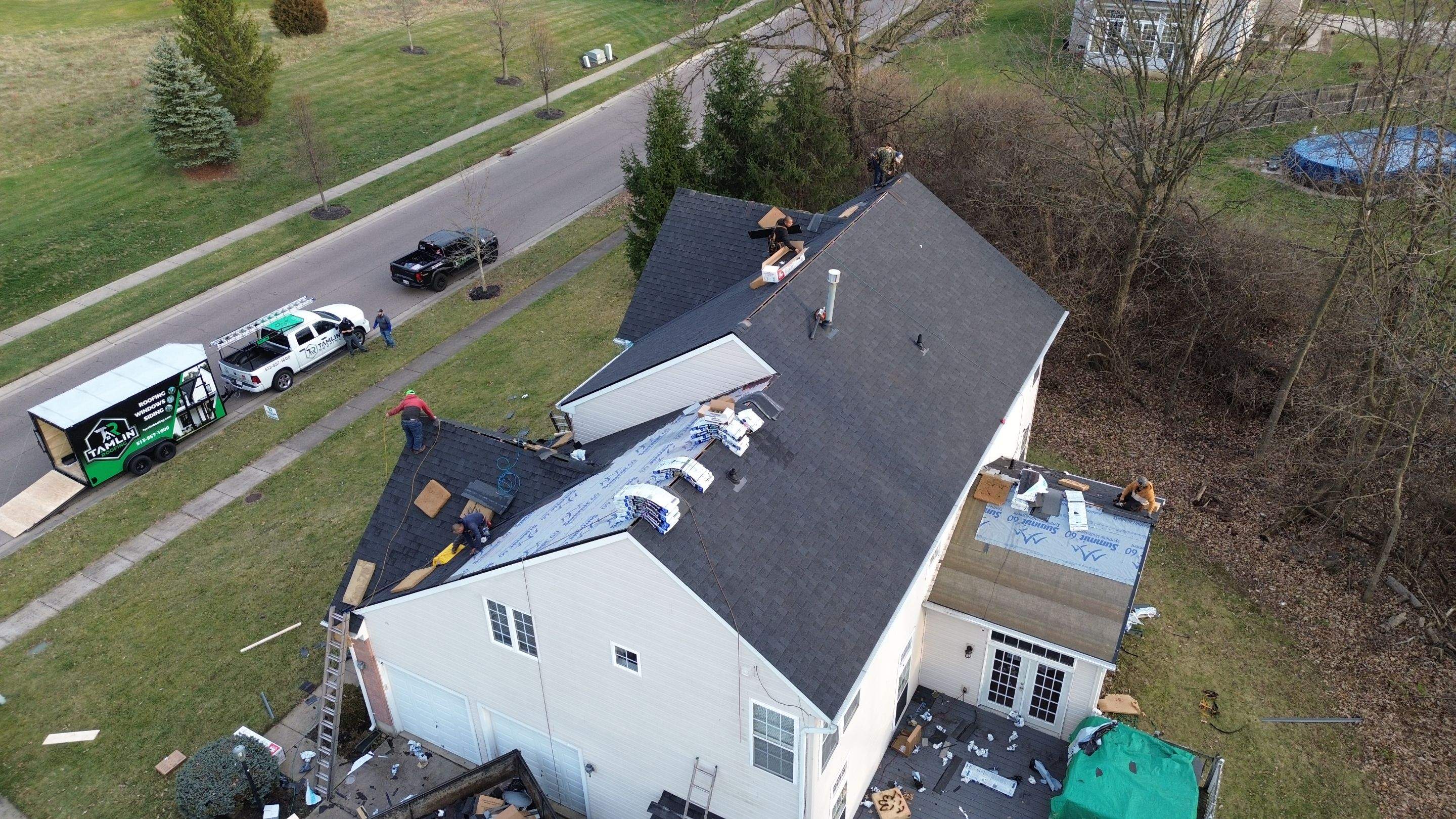 Walden Ponds - Pristine Black and Hydro Flo Gutter Guards by Tamlin Roofing