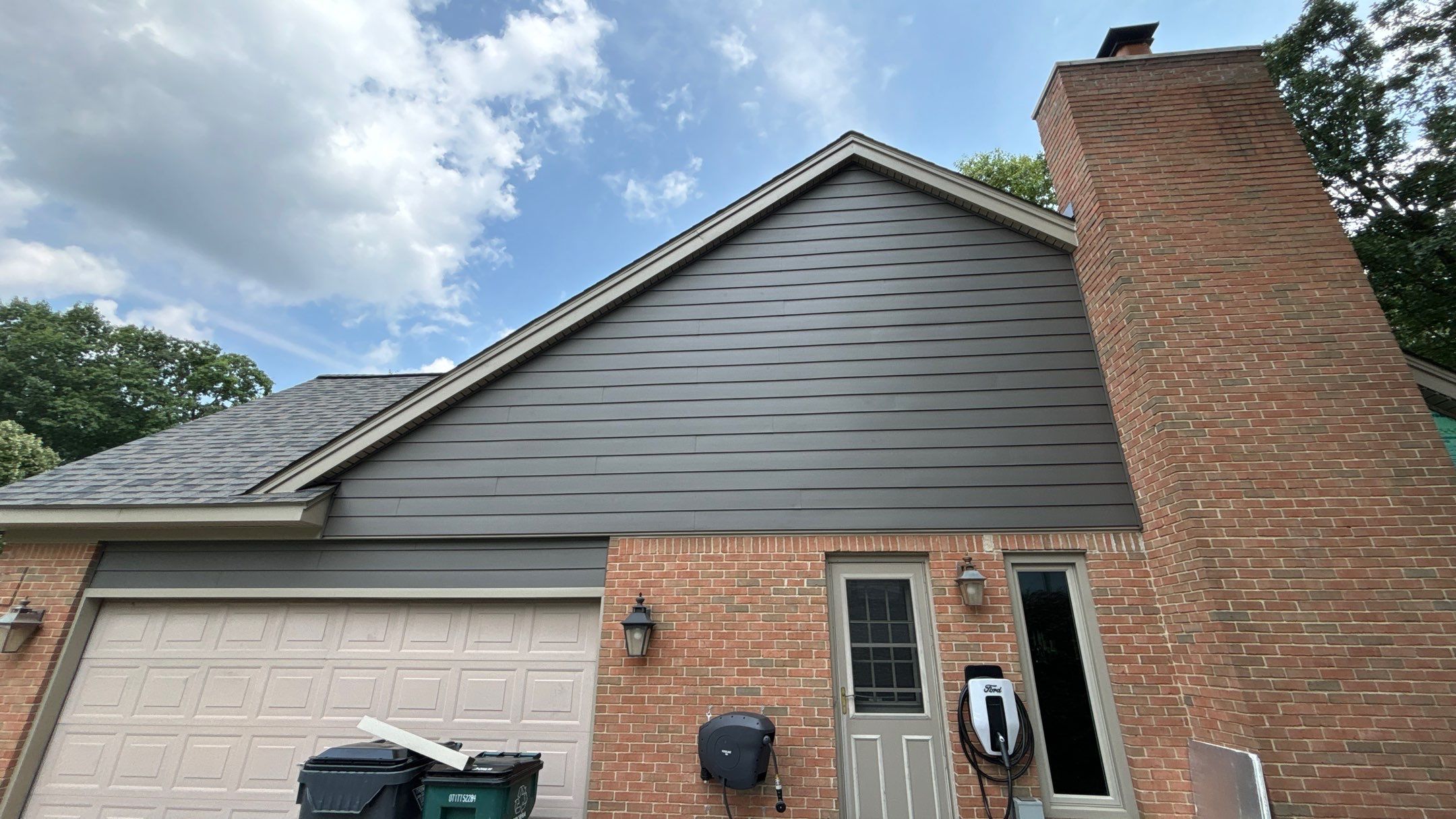 Roof Replacement using Owens Corning Peppercorn and Siding Replacement using Ascend Charcoal Smoke by 180 Contractors