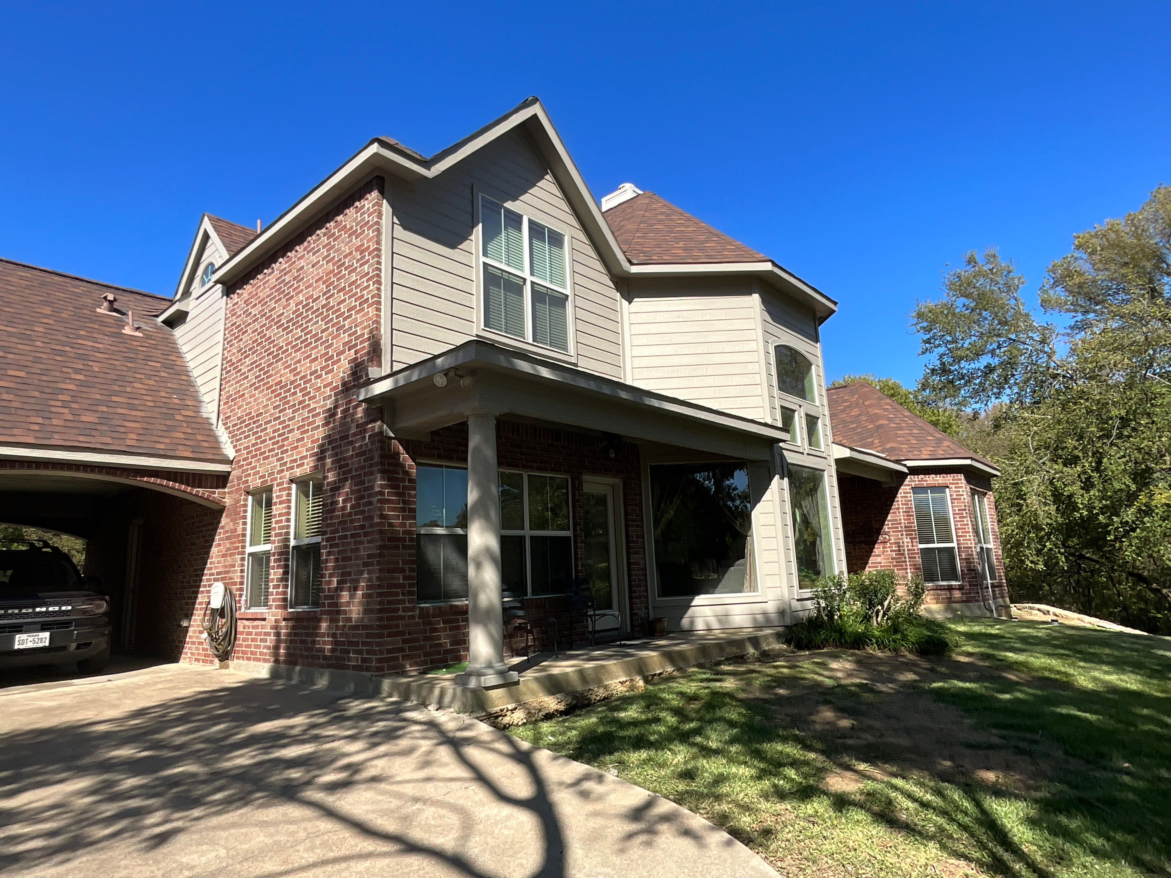 Insurance Claim Roof Paint and Gutters by Tex-Line Roofing