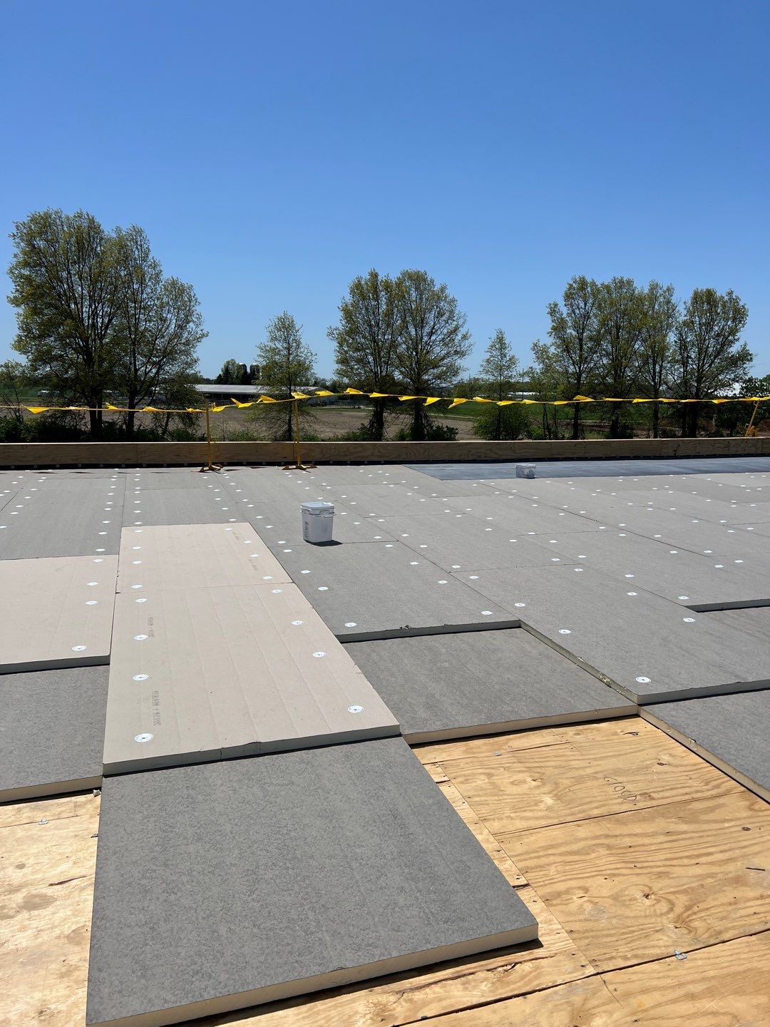 Commercial Roofing Installation using 60 mil rubber roof  by Nitro Roofing and Construction