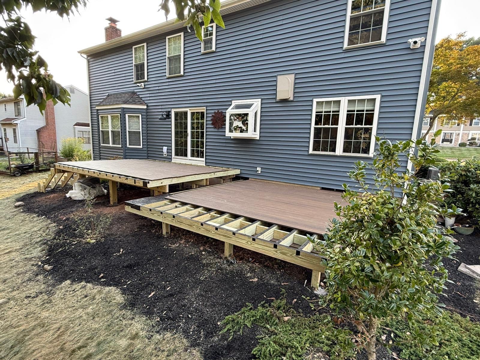 Deck resurface with Trex and cable rails by deck guardian